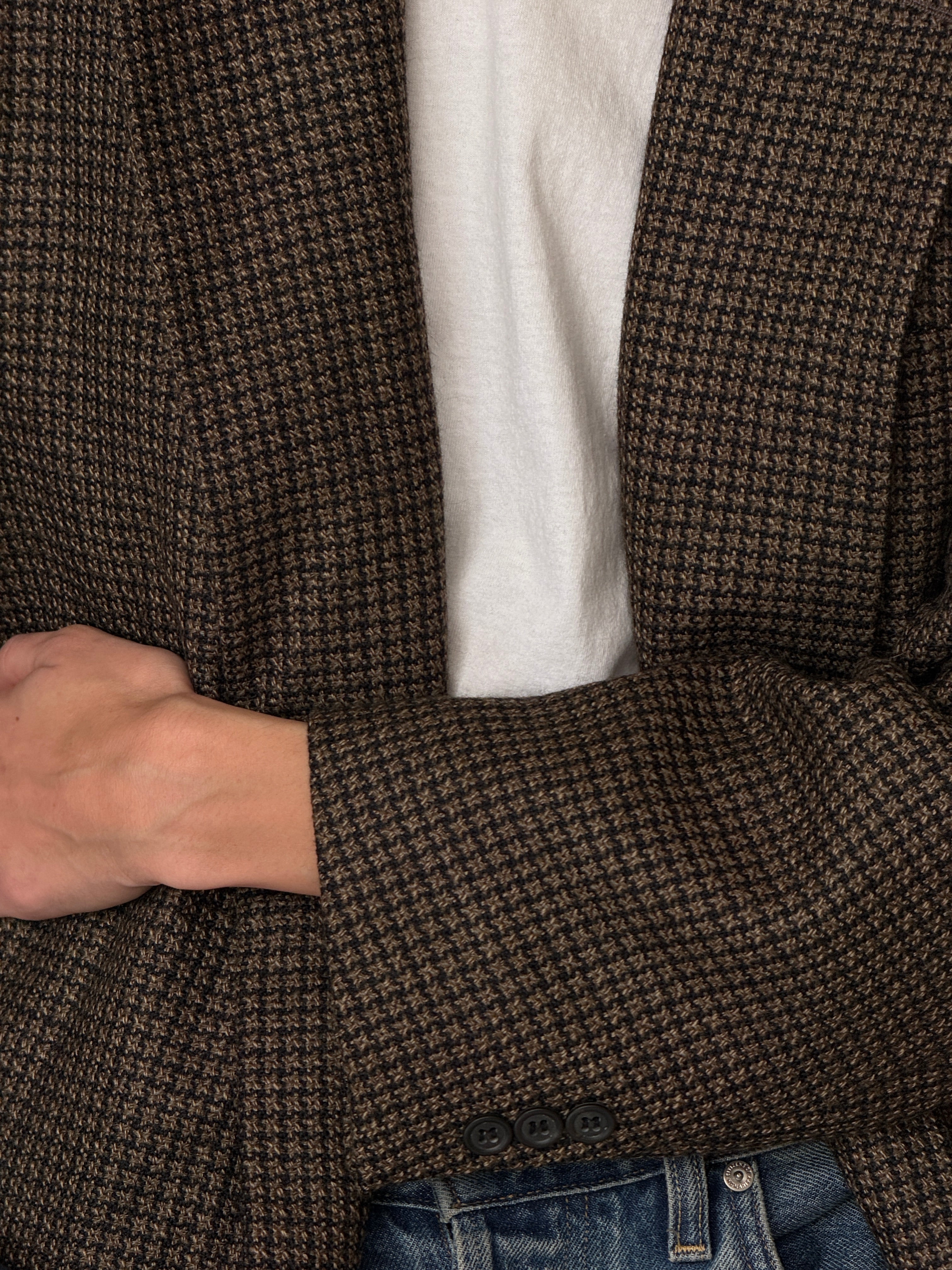 Vintage wool blazer sleeve detail with buttoned cuff