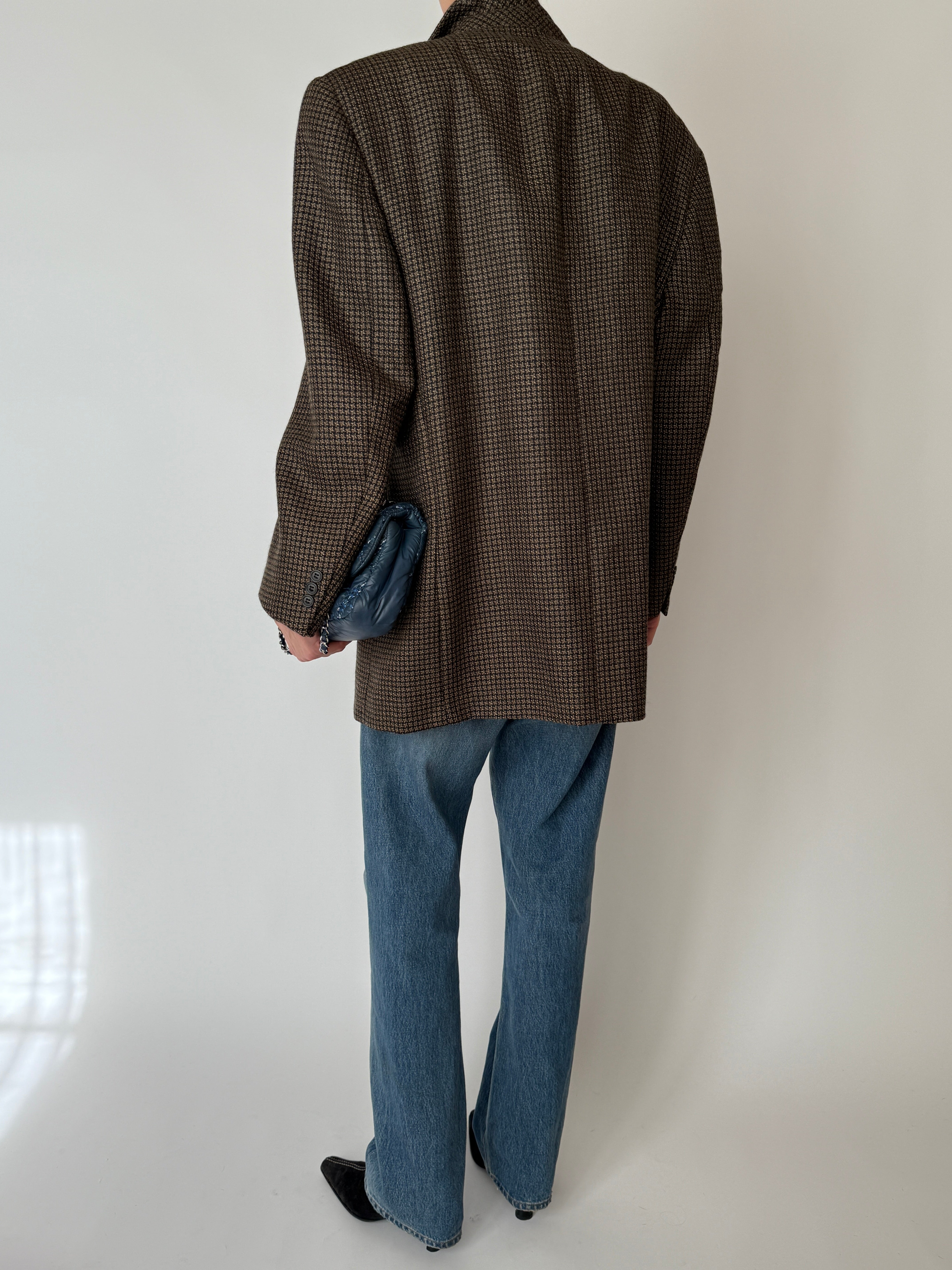 Brown wool houndstooth blazer shown from the back