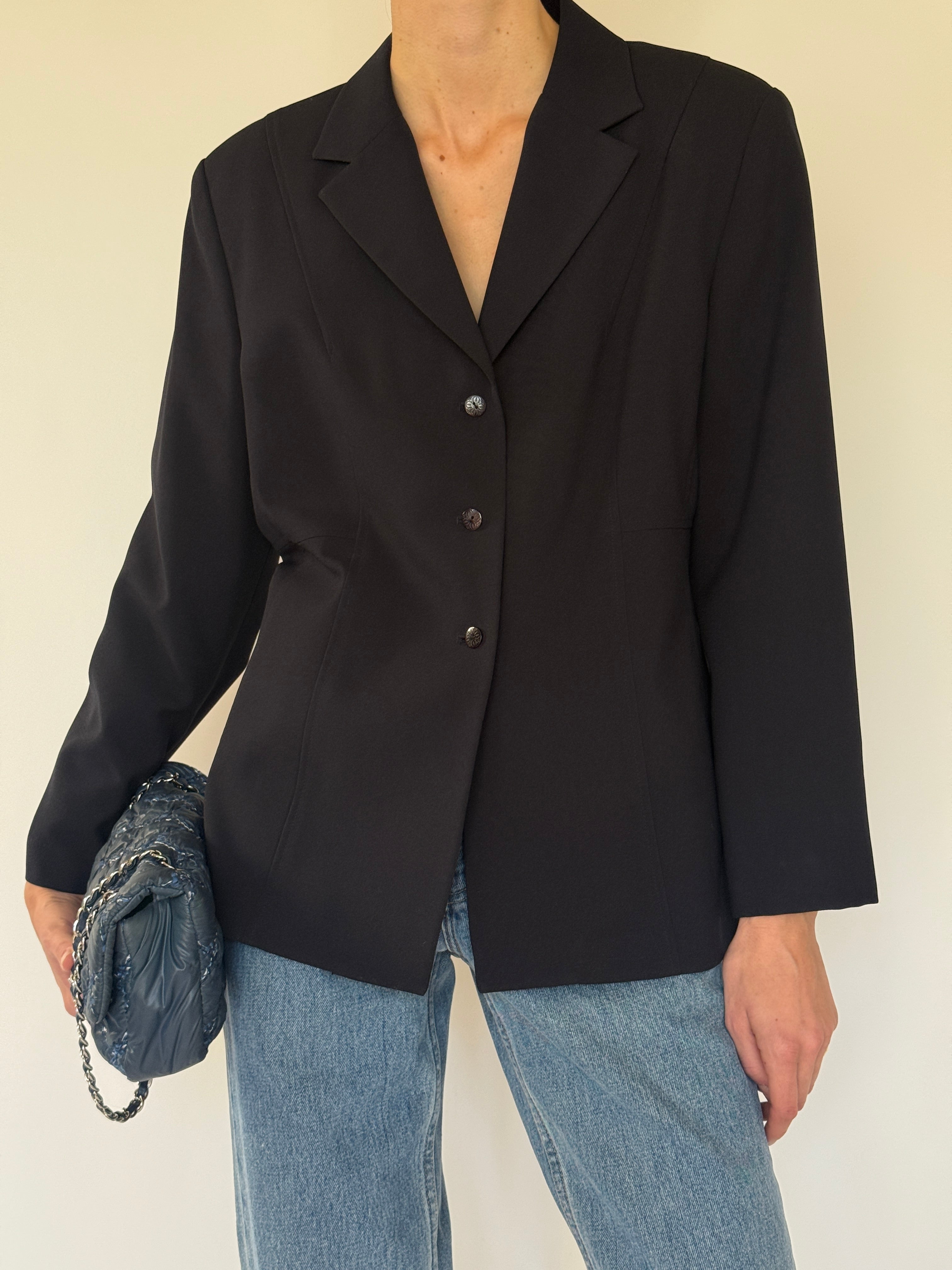 Vintage black single-button blazer lapel detail
