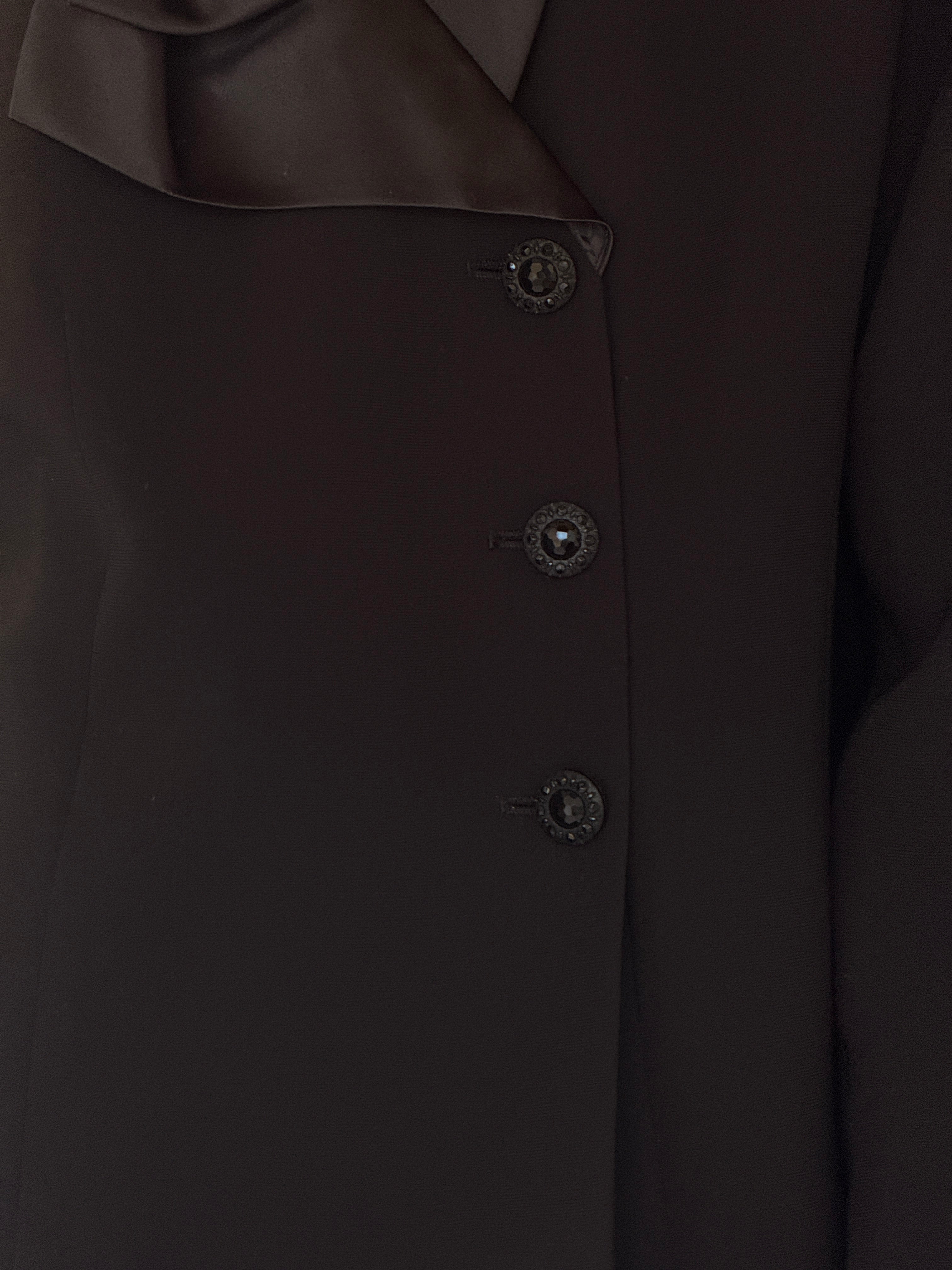 Vintage black blazer satin collar fabric close-up