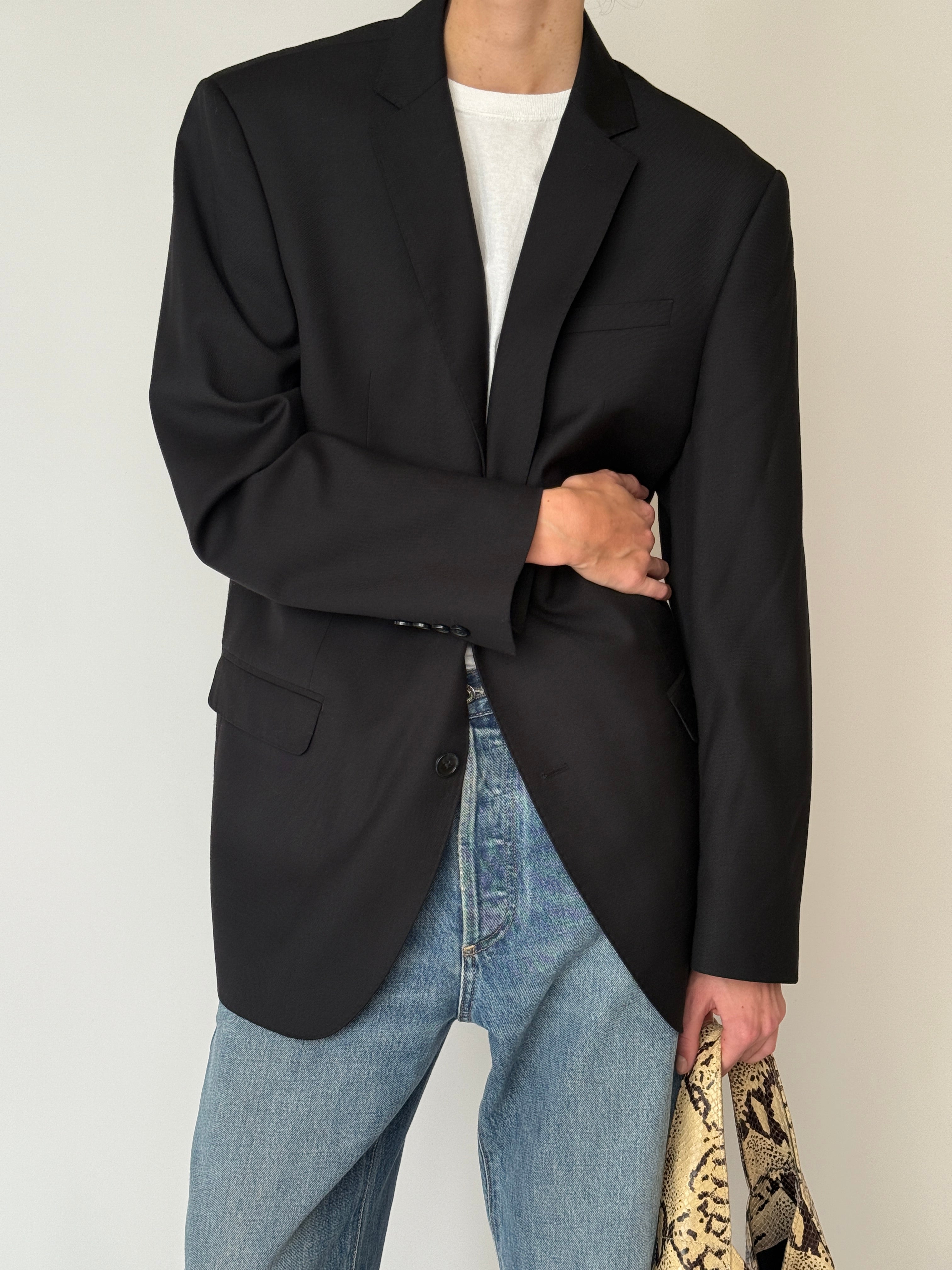Vintage Italian-made black blazer shown from the front