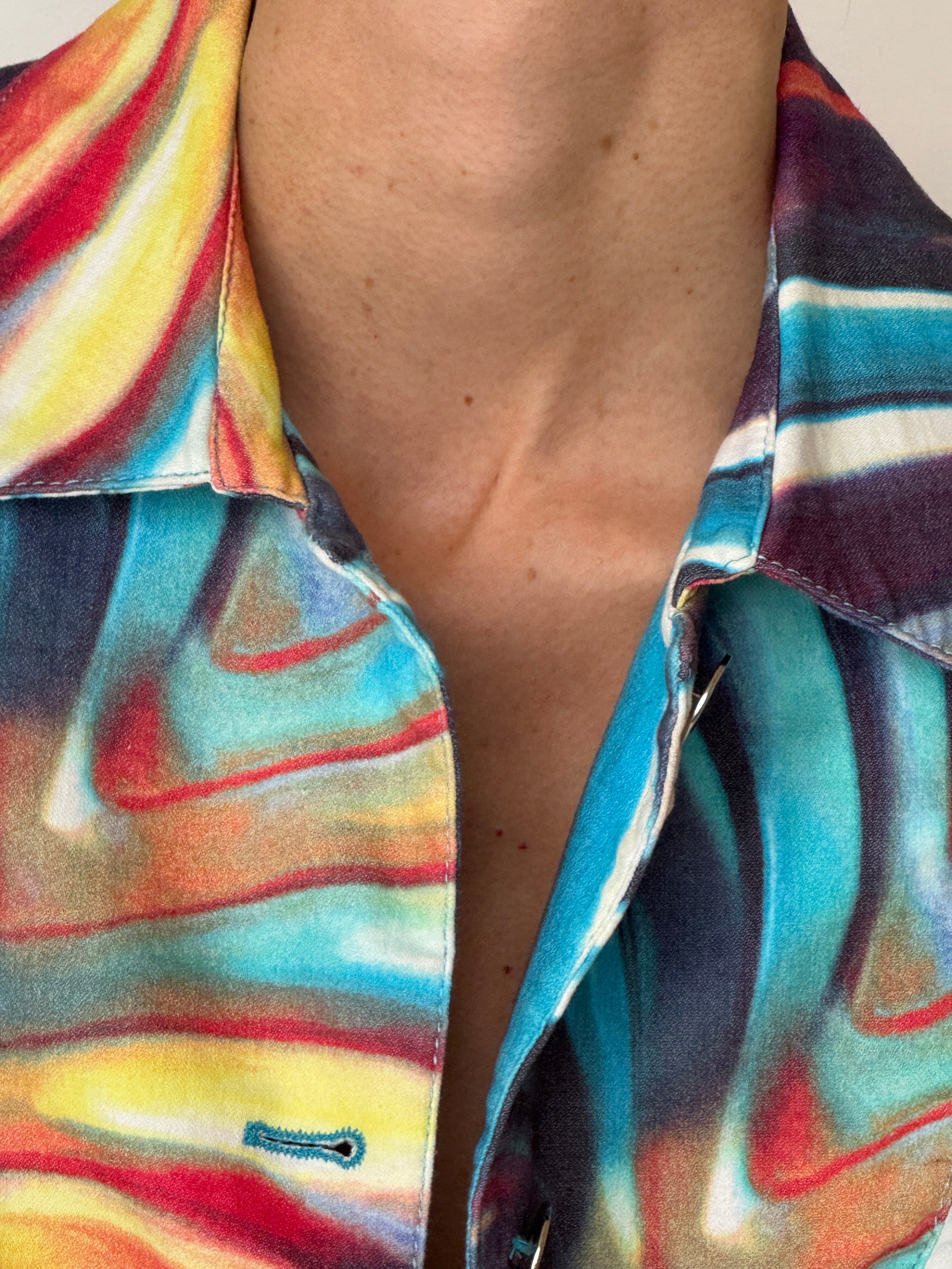 Vintage printed jacket featuring a colorful swirl pattern and pointed collar