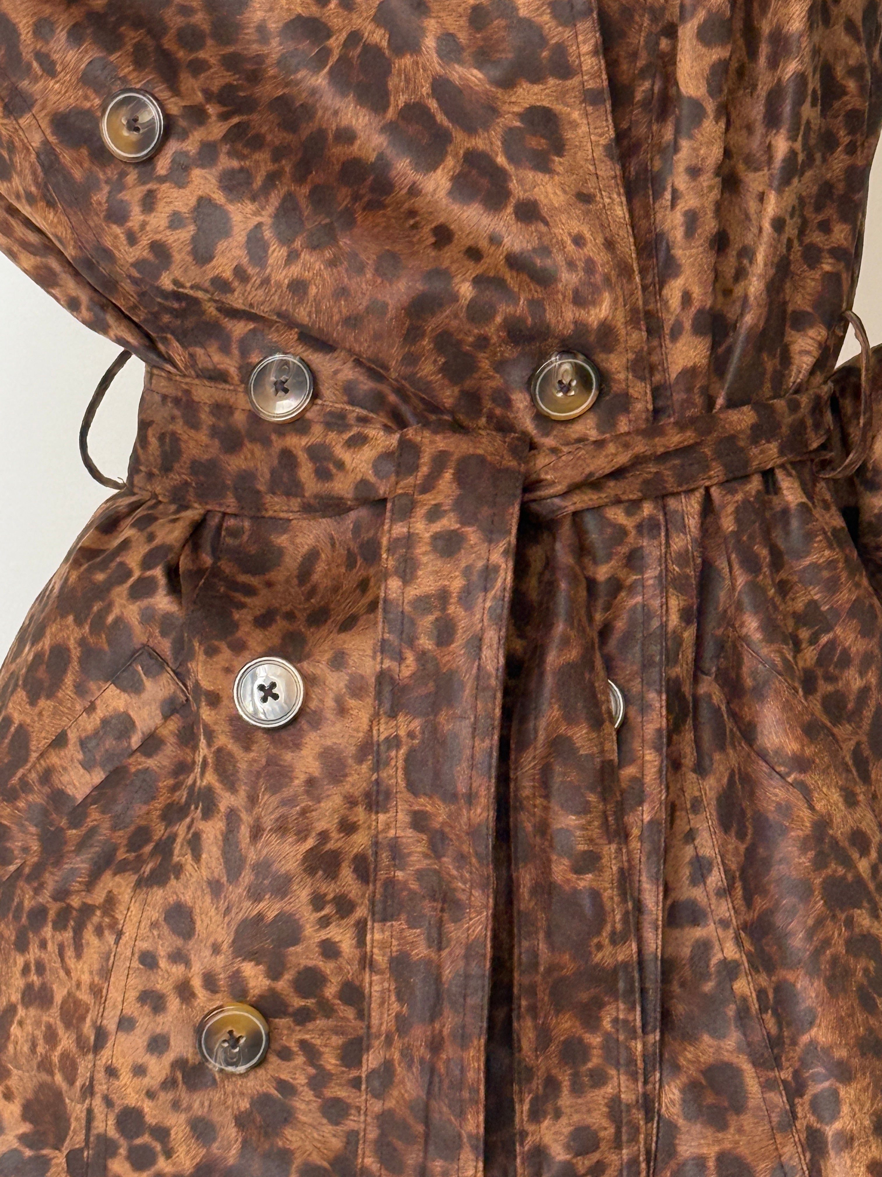 Close-up of vintage leopard print trench coat fabric texture vintage