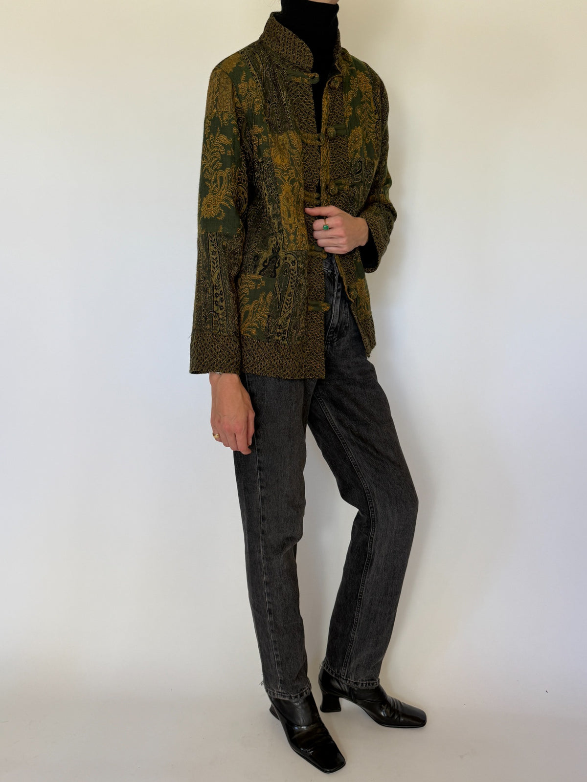 Side view of paisley tapestry jacket