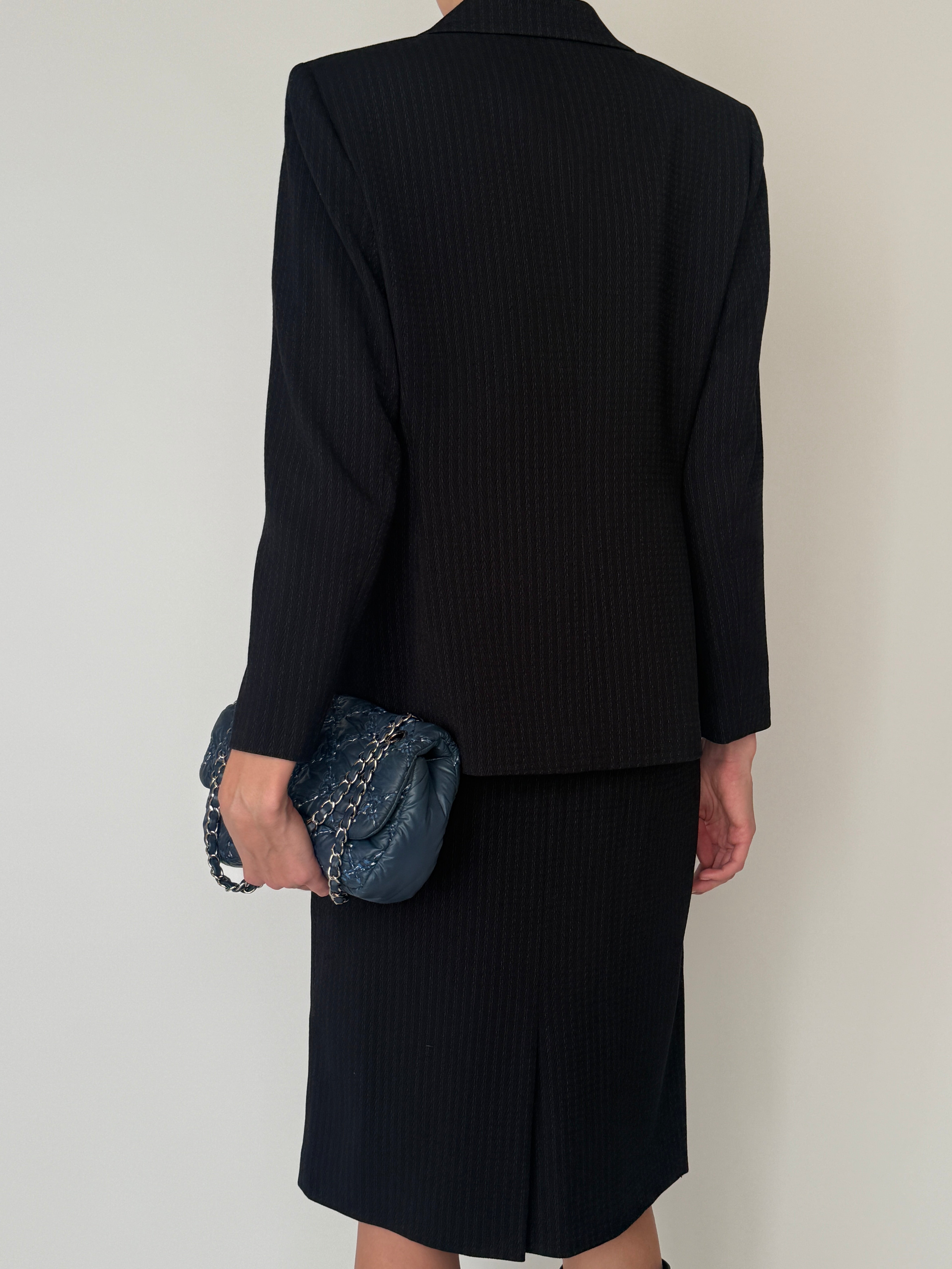 Vintage dark grey structured skirt suit back view