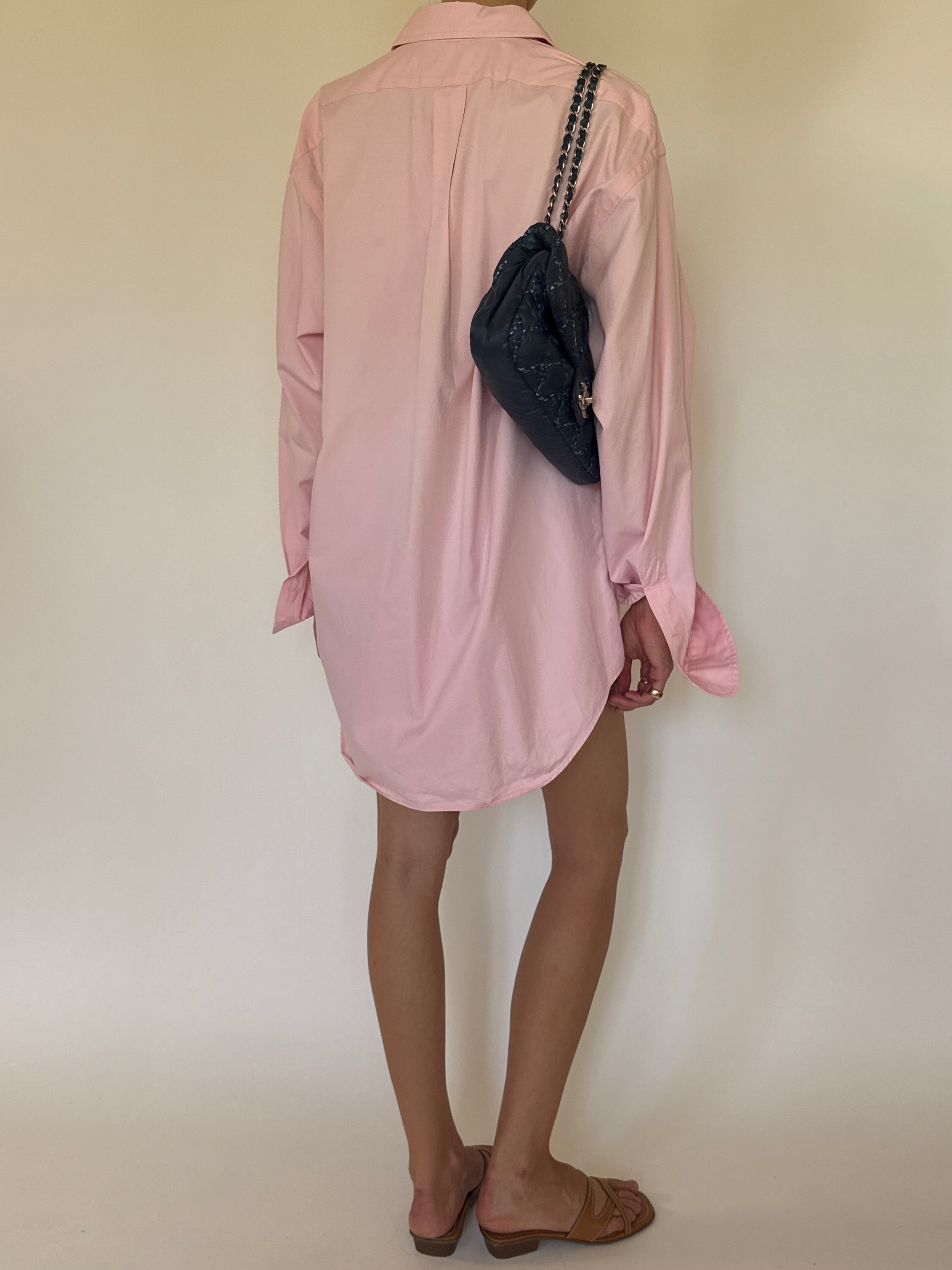 Vintage Polo Ralph Lauren oversized pink button-up shirt back view.