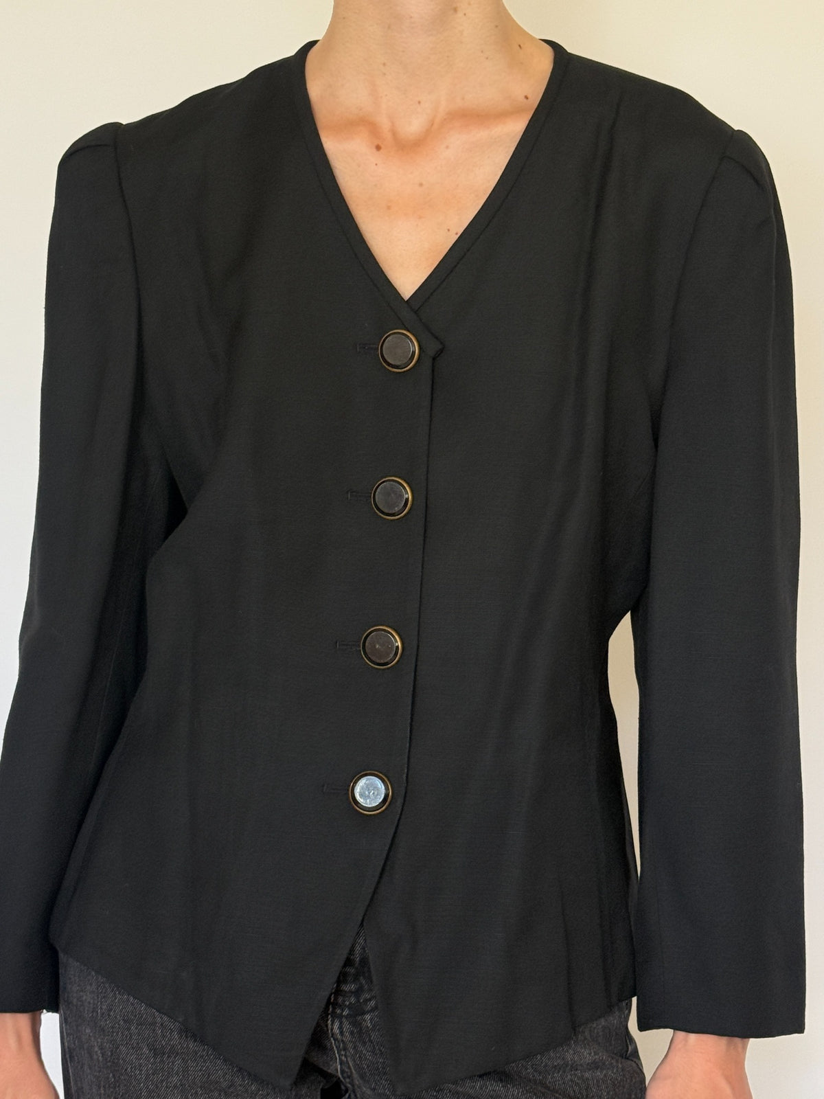 Front view of tailored black blazer