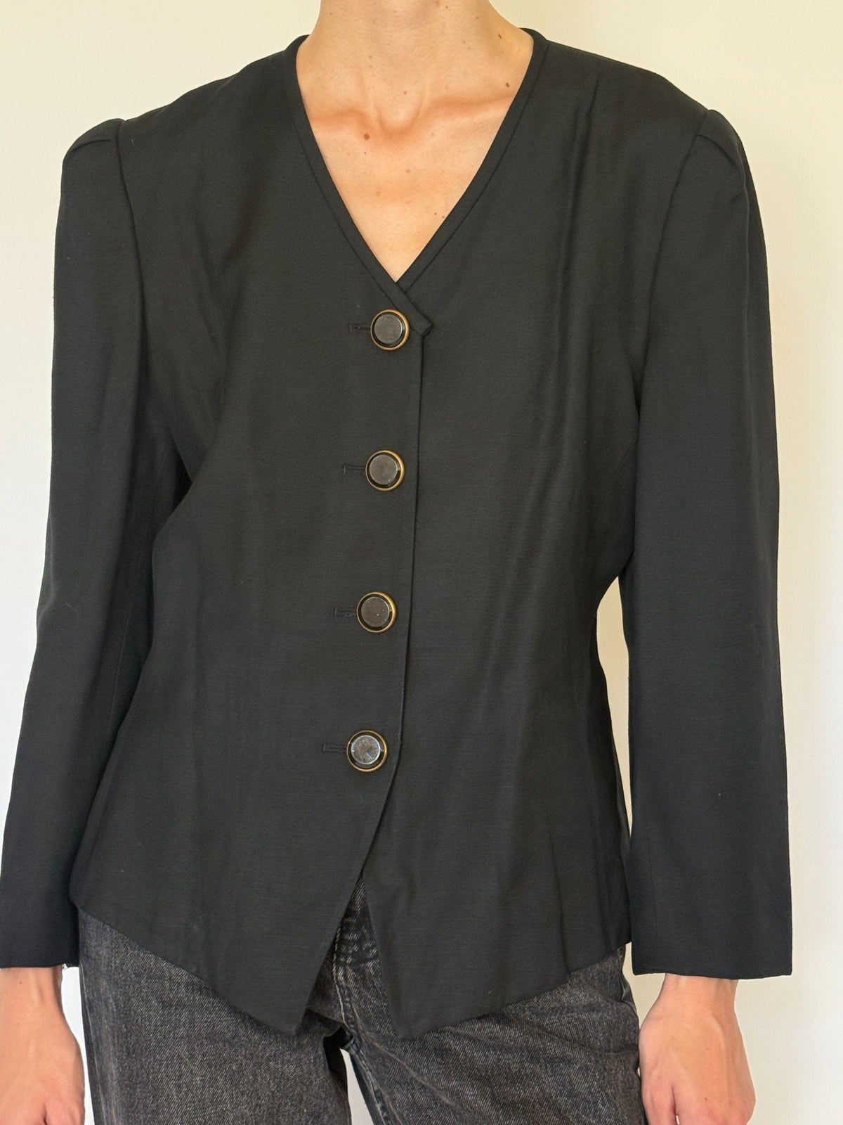 Front full-length view of vintage black blazer