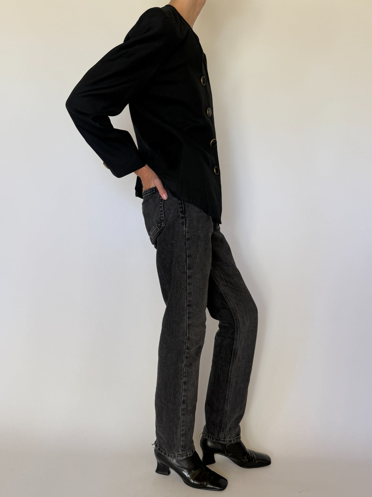 Side view of black tailored blazer