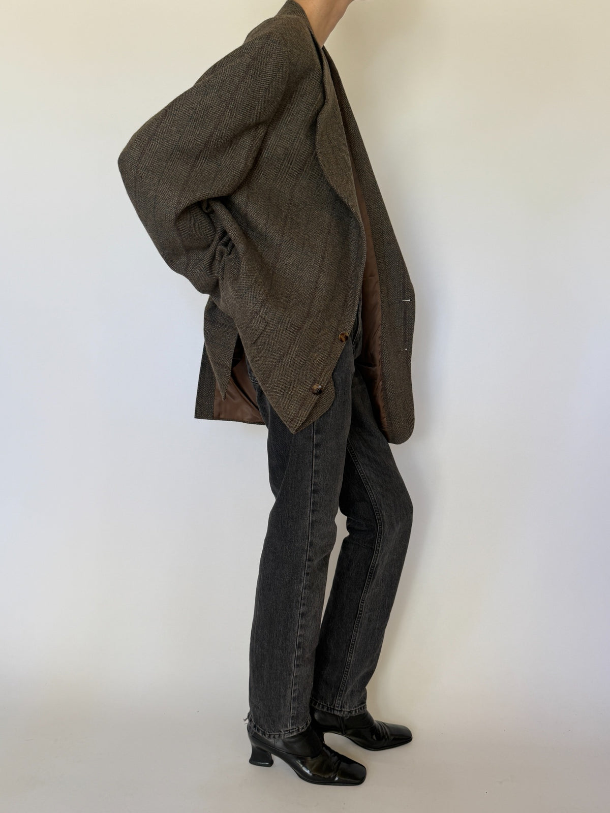 Side view of brown wool blazer