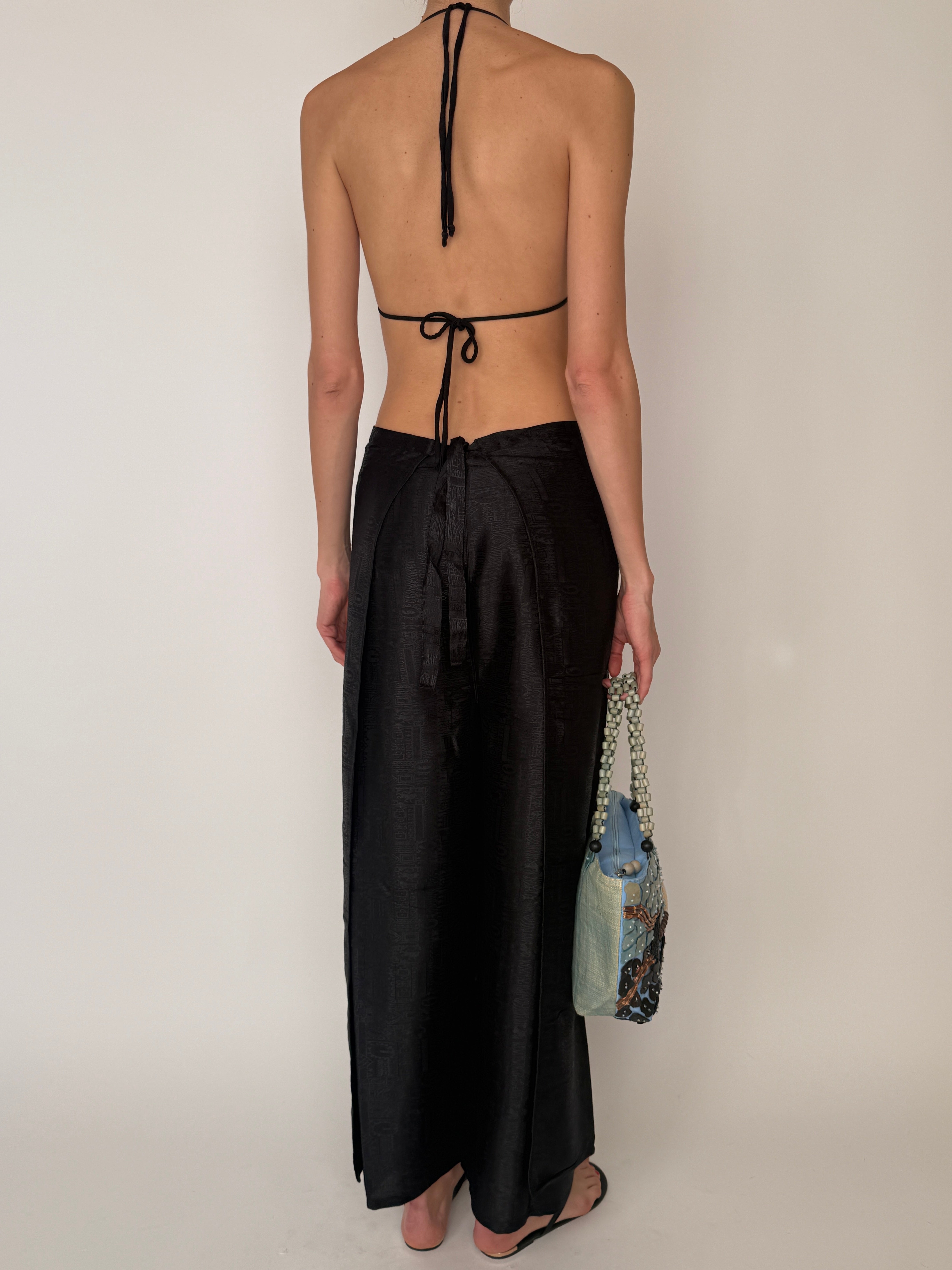 Vintage black lightweight pants with straight cut back view