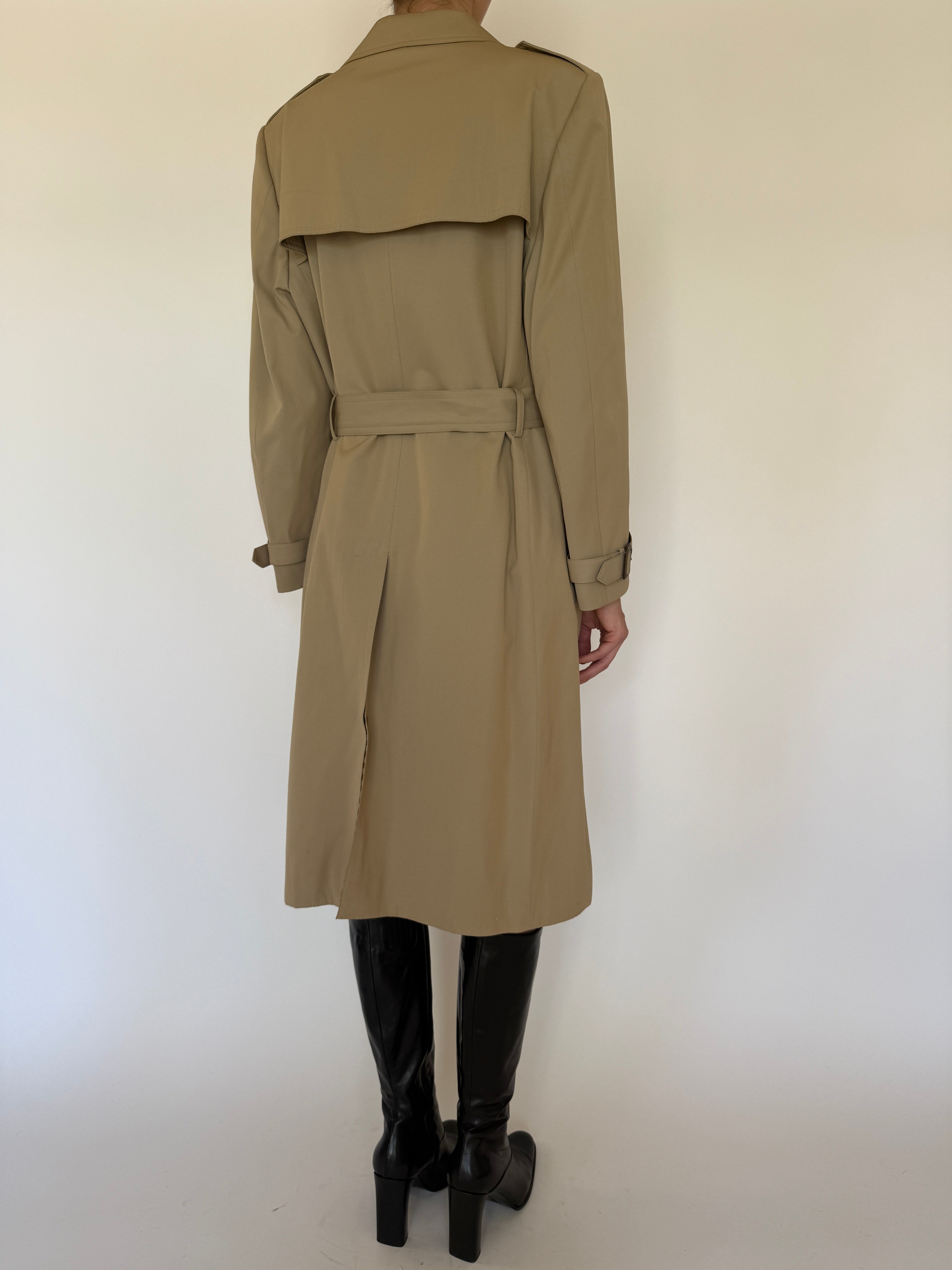 Vintage beige trench coat back view with storm flap