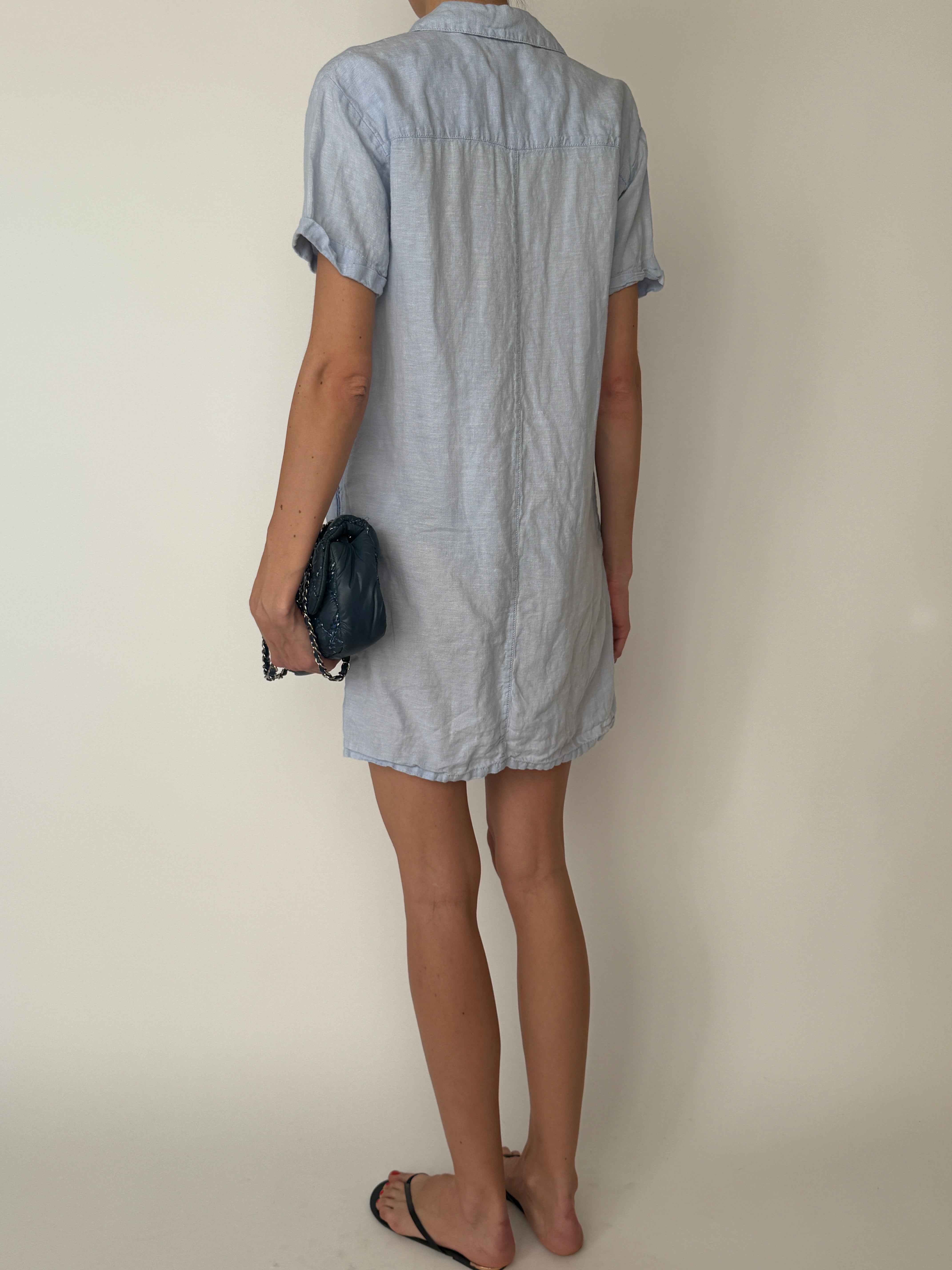 Vintage breathable linen dress with soft drape and short sleeves in light blue back view