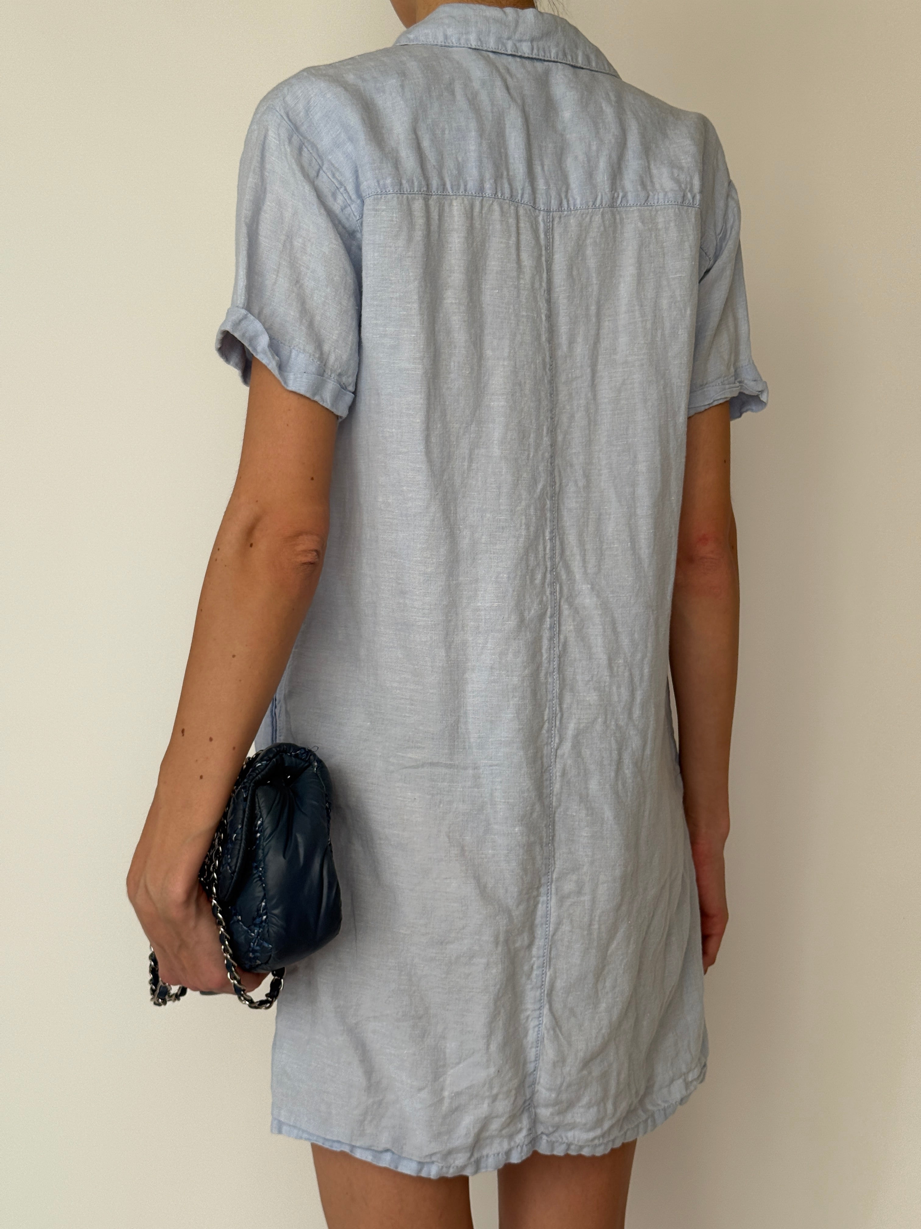 Vintage breathable linen dress with soft drape and short sleeves in light blue back view