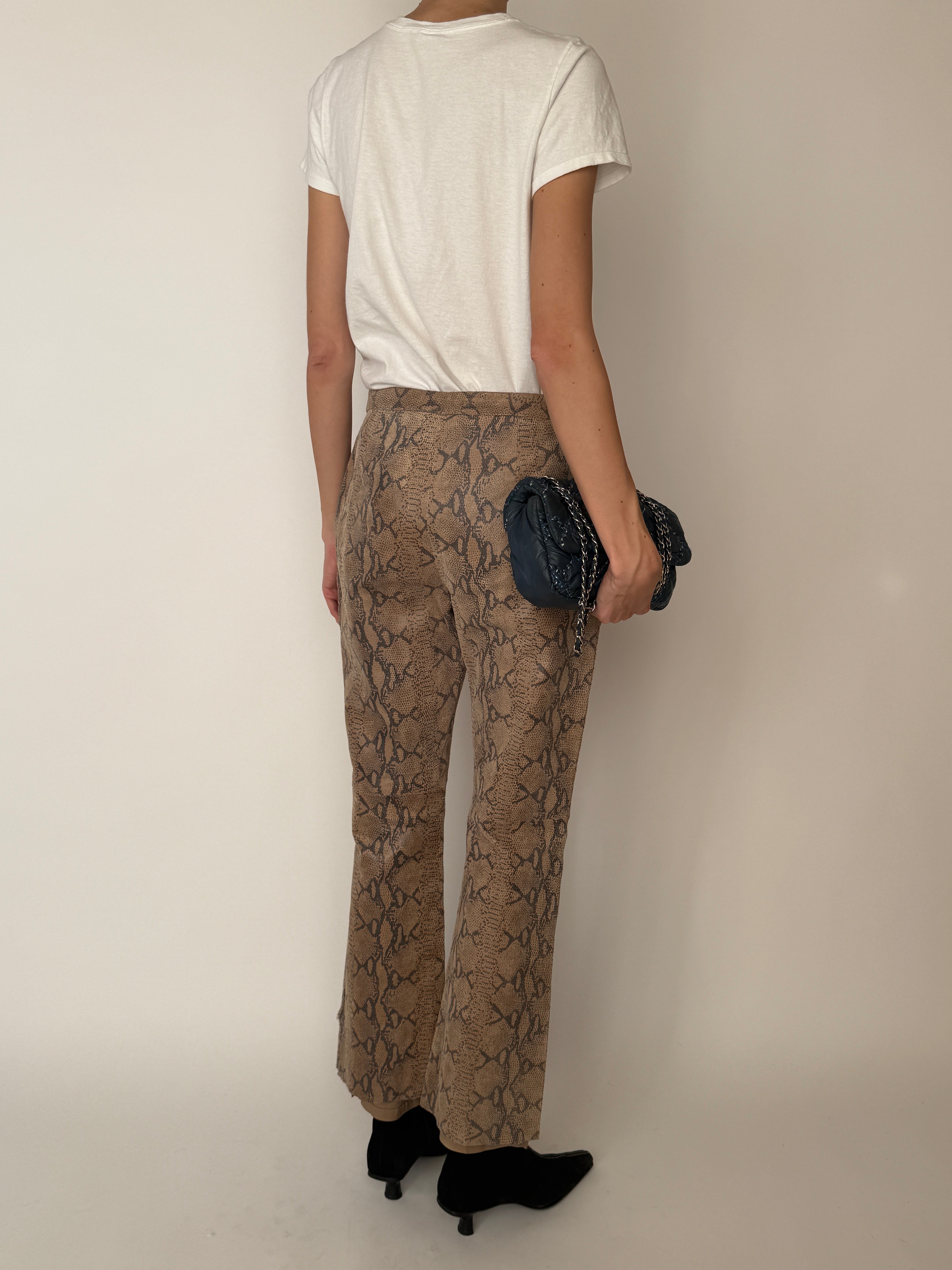 Vintage snakeskin leather straight-leg pants with high-rise waist brown back view styled