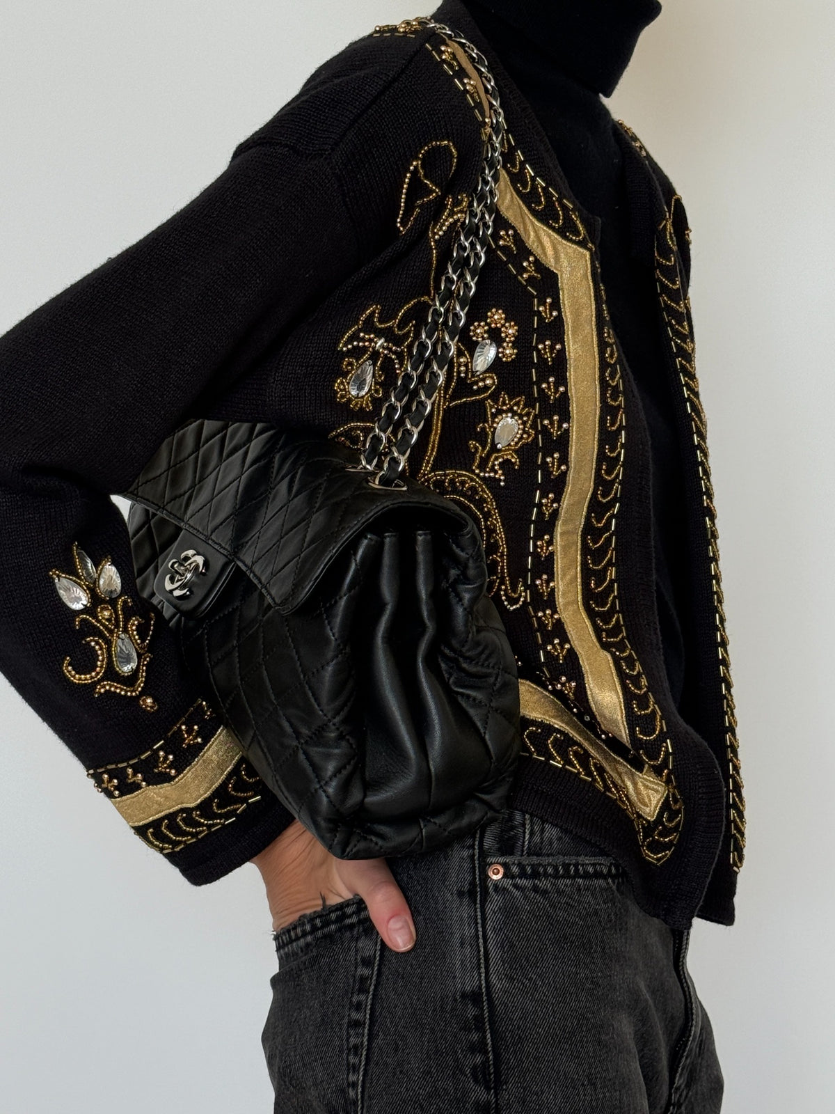 Close-up of ornate gold trim and decorative beading