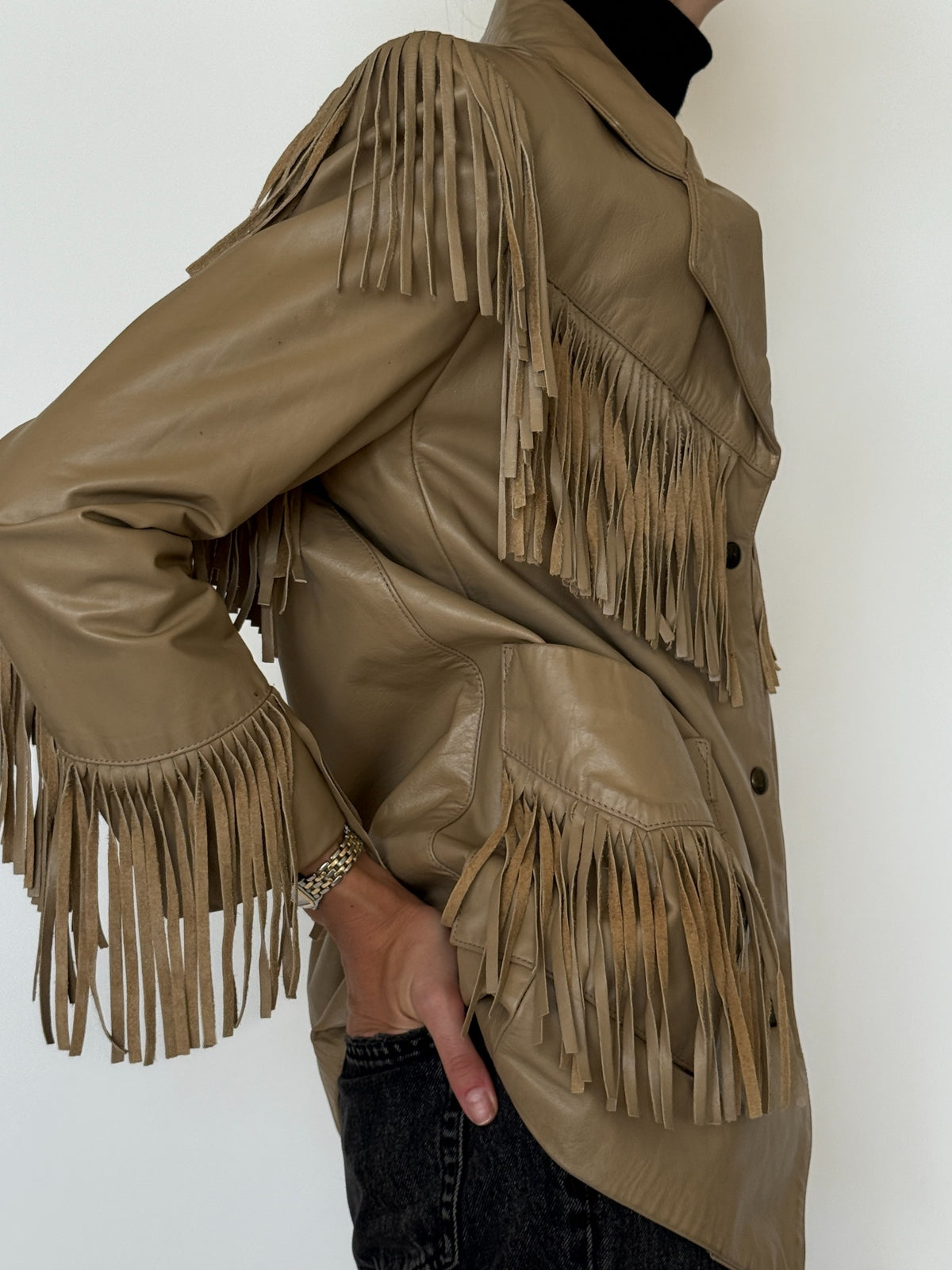 Close-up of sleeve and shoulder fringe