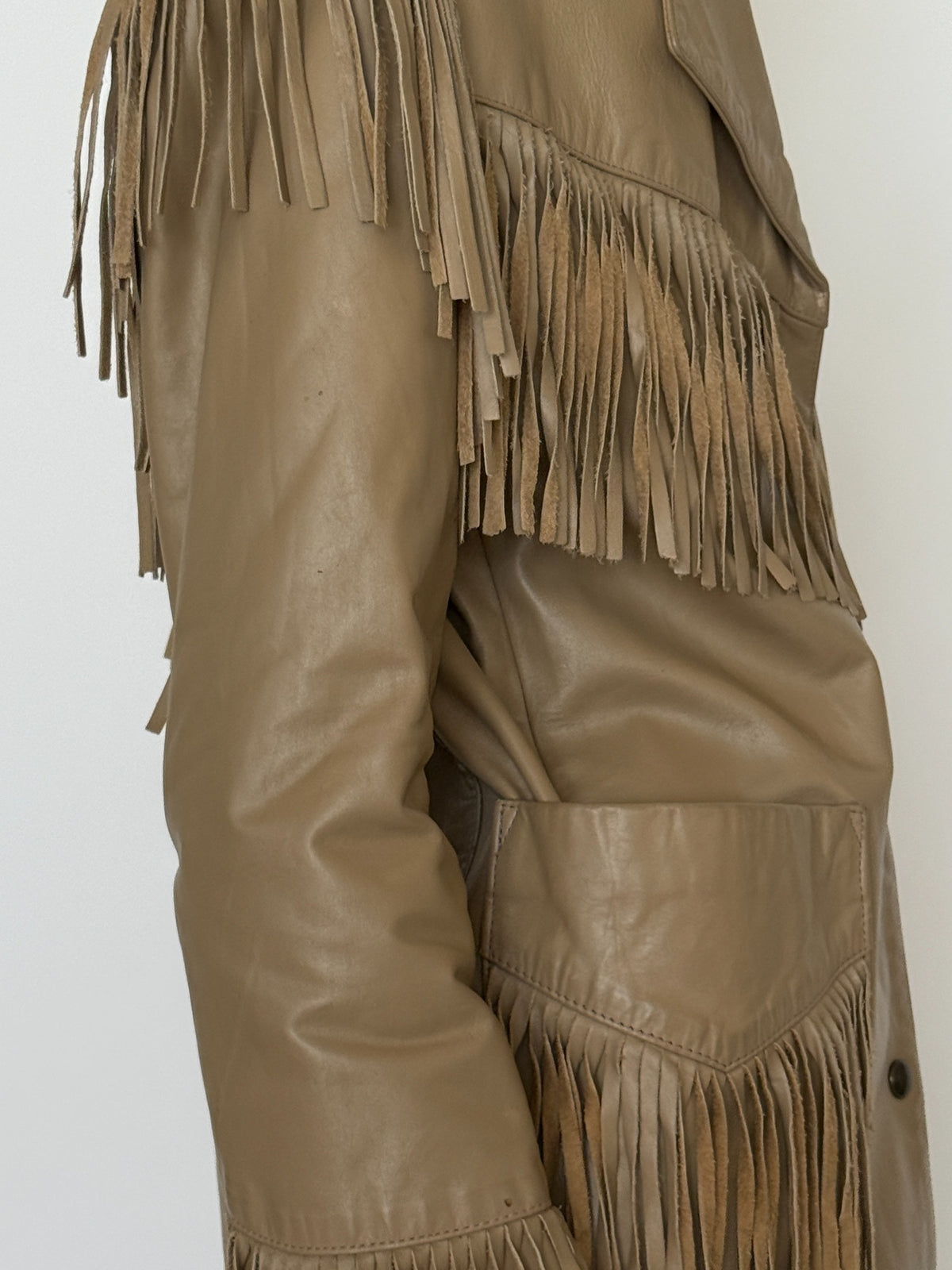 Side detail of leather jacket pocket
