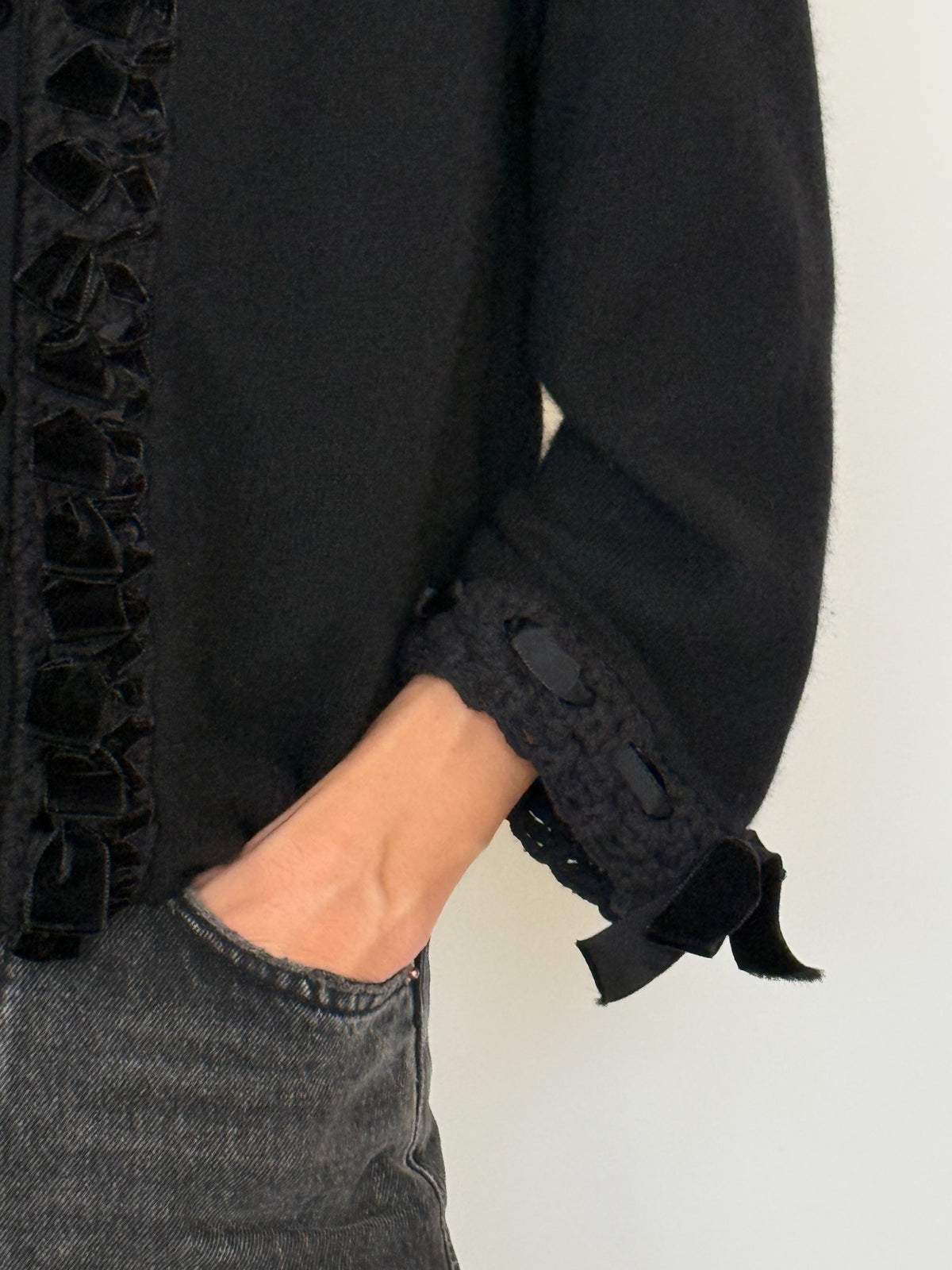 Vintage black cashmere cardigan cuff and velvet bow detail