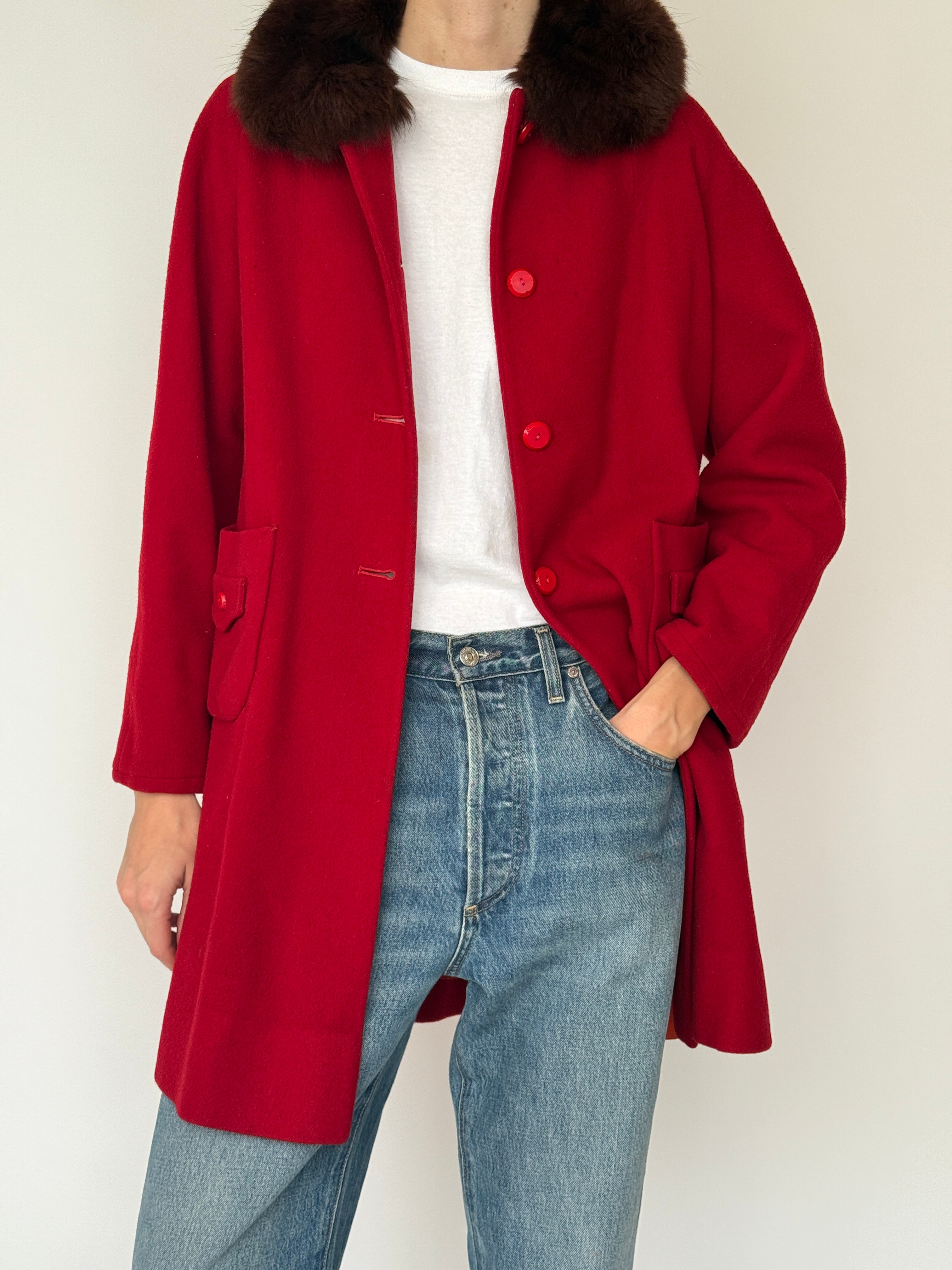 Vintage wool coat featuring plush fur collar in red