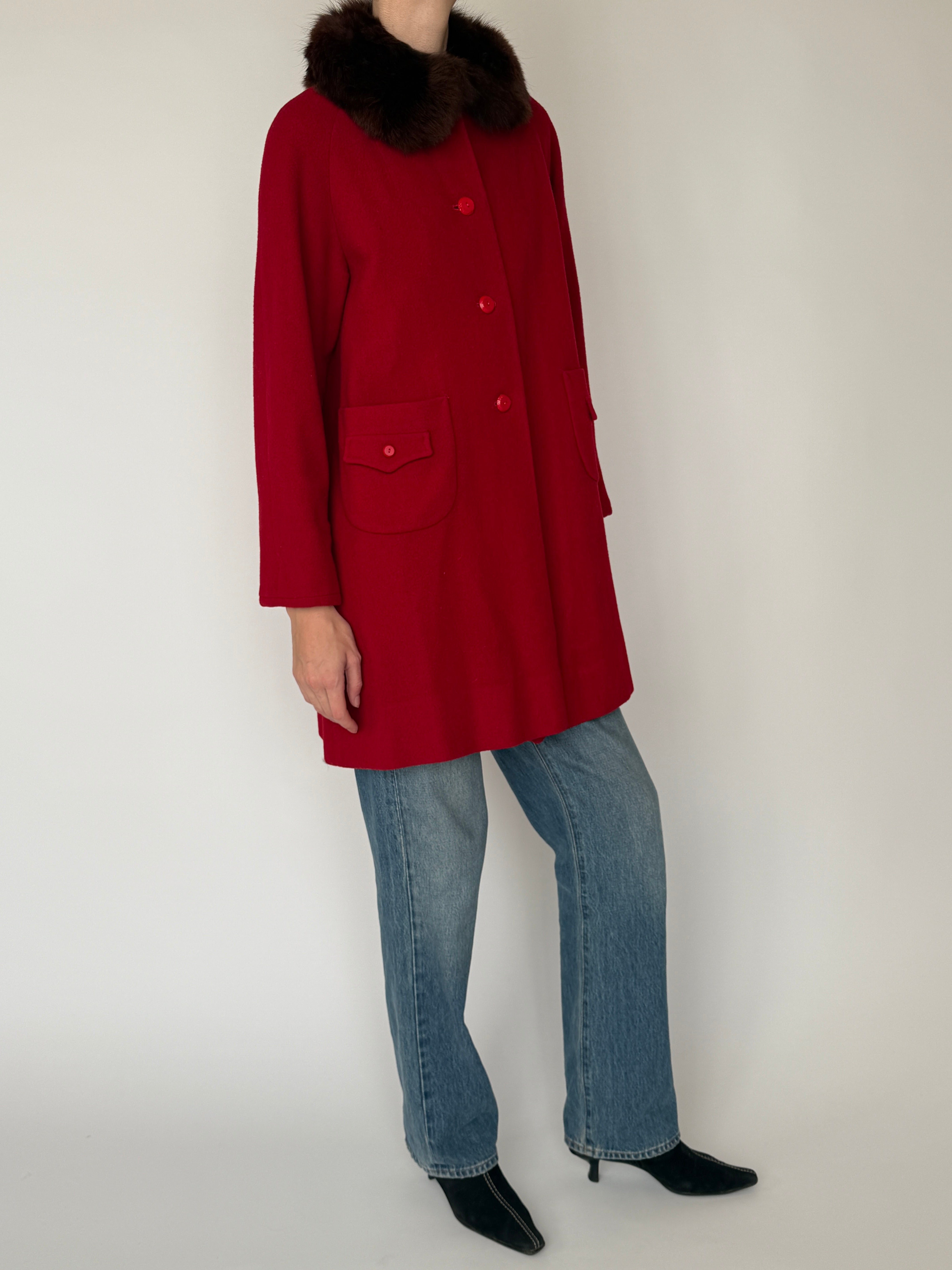 Vintage red wool coat with fur collar and button front side view