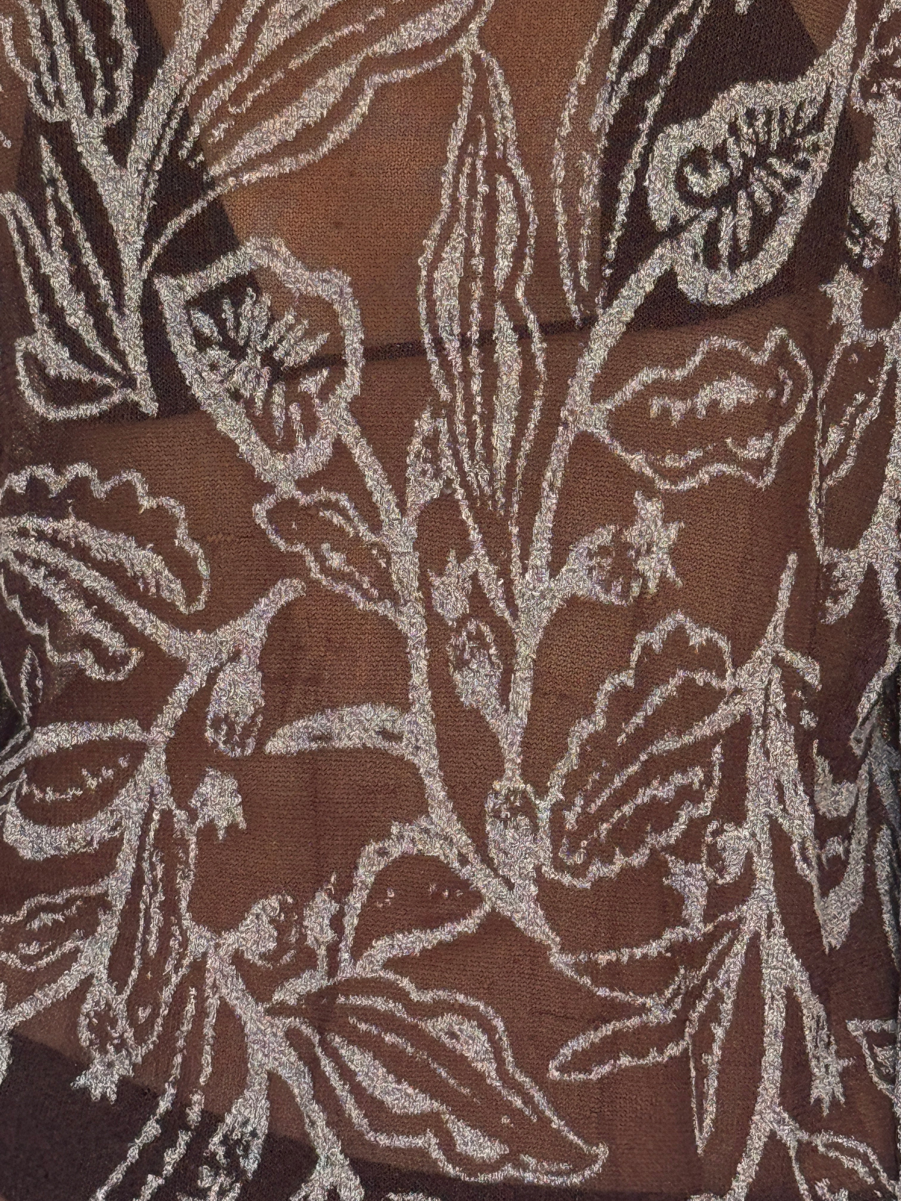Vintage floral knit fabric close-up