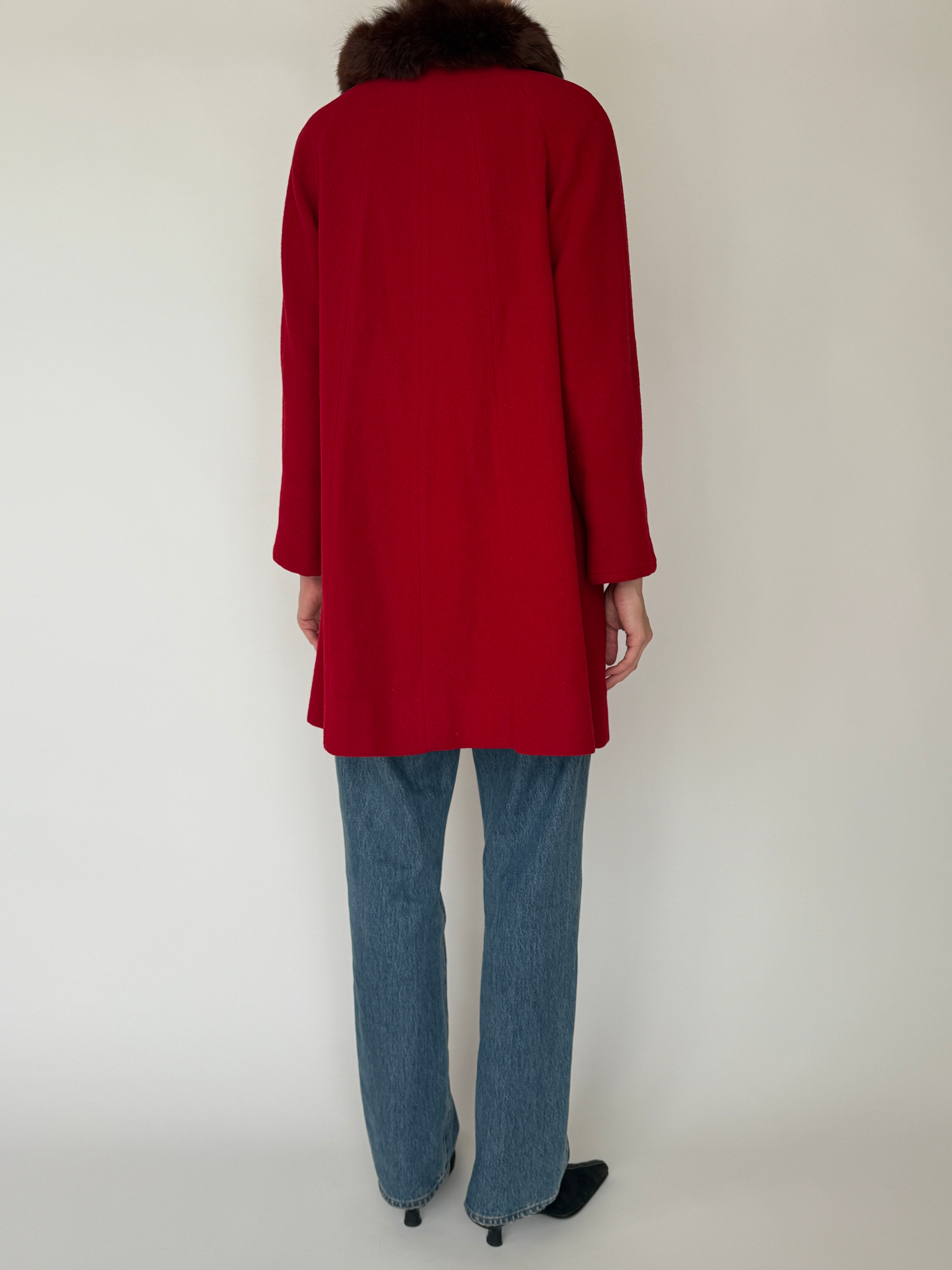 Vintage classic wool coat with front pockets and fur collar in red back view