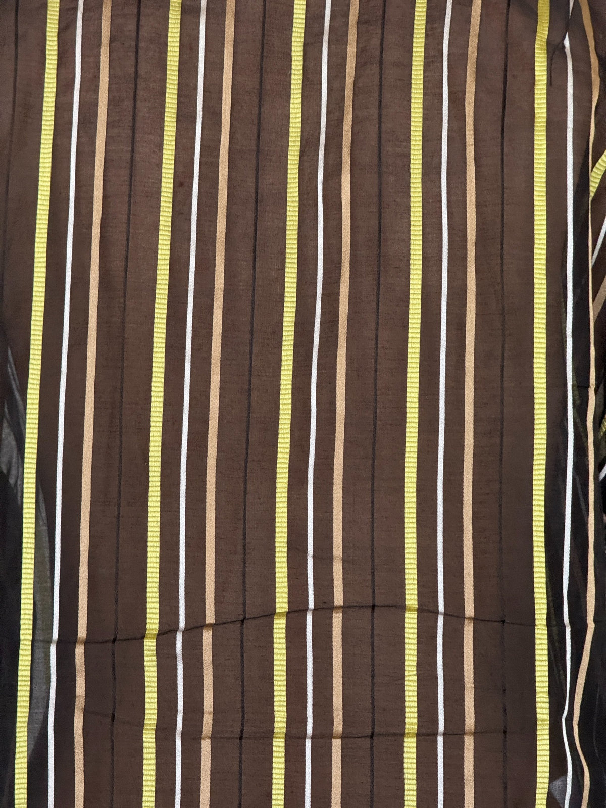 Stripe fabric close-up of vintage black brown green striped cotton silk shirt