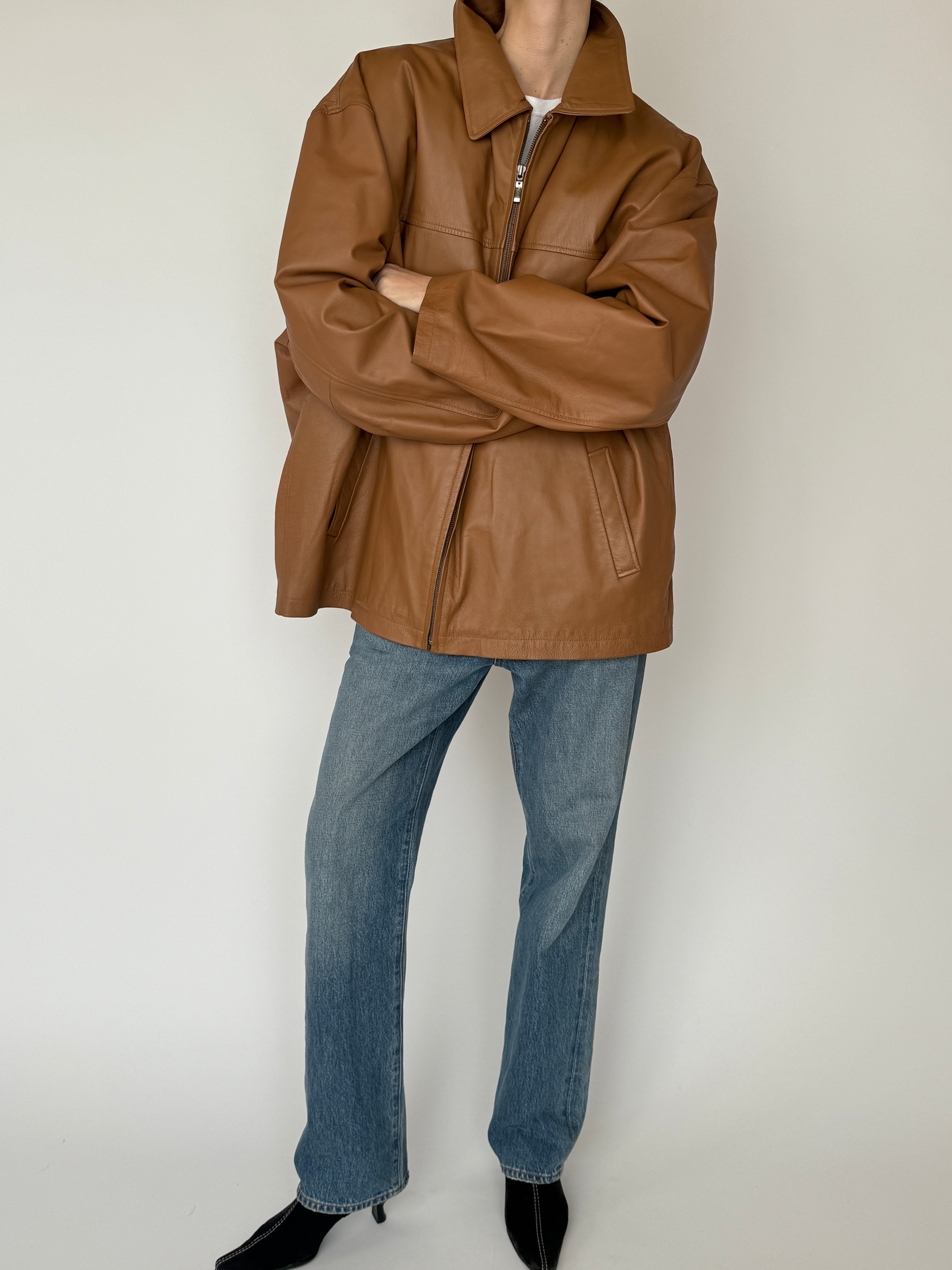 Vintage brown leather jacket zipper detail