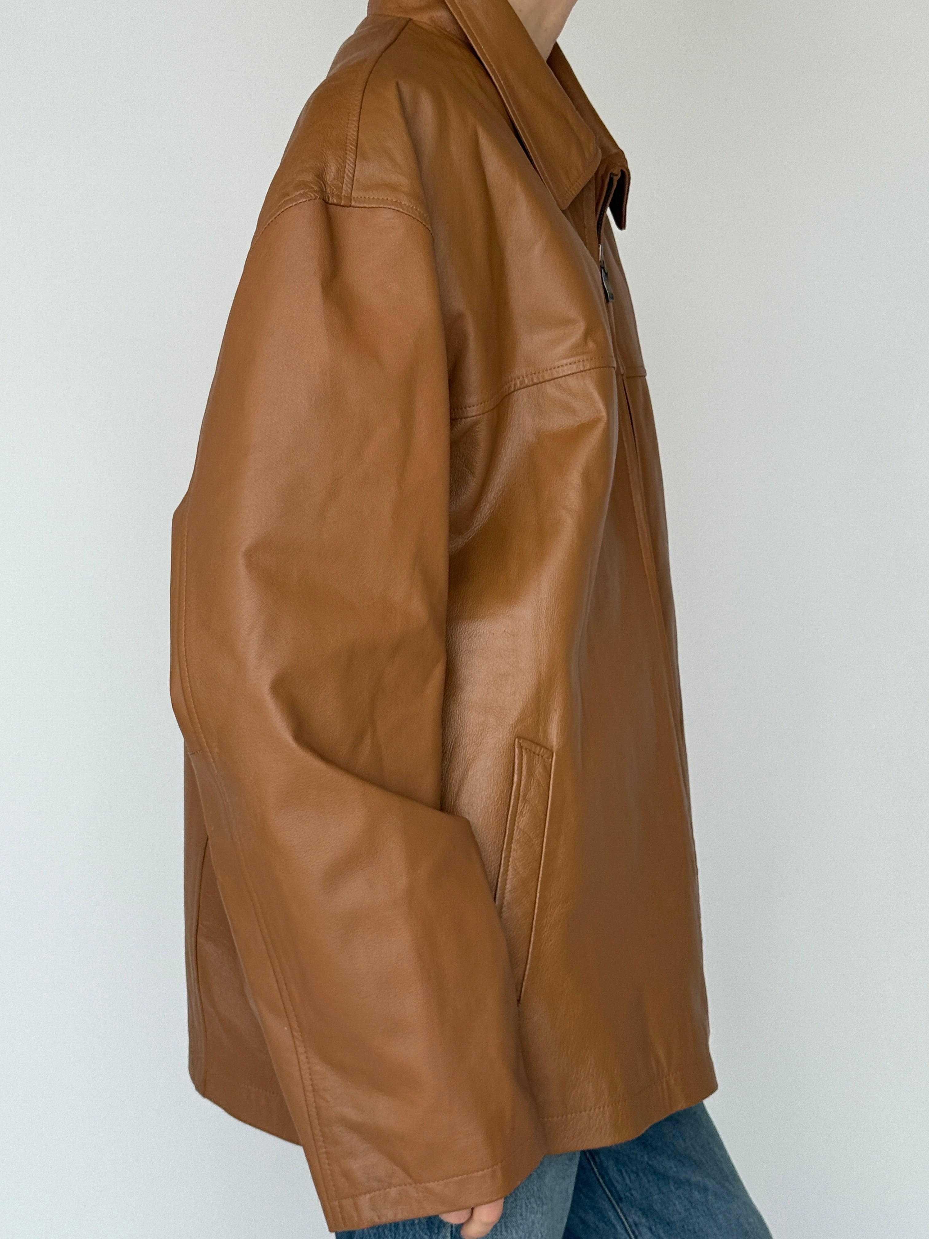 Vintage brown leather jacket side view