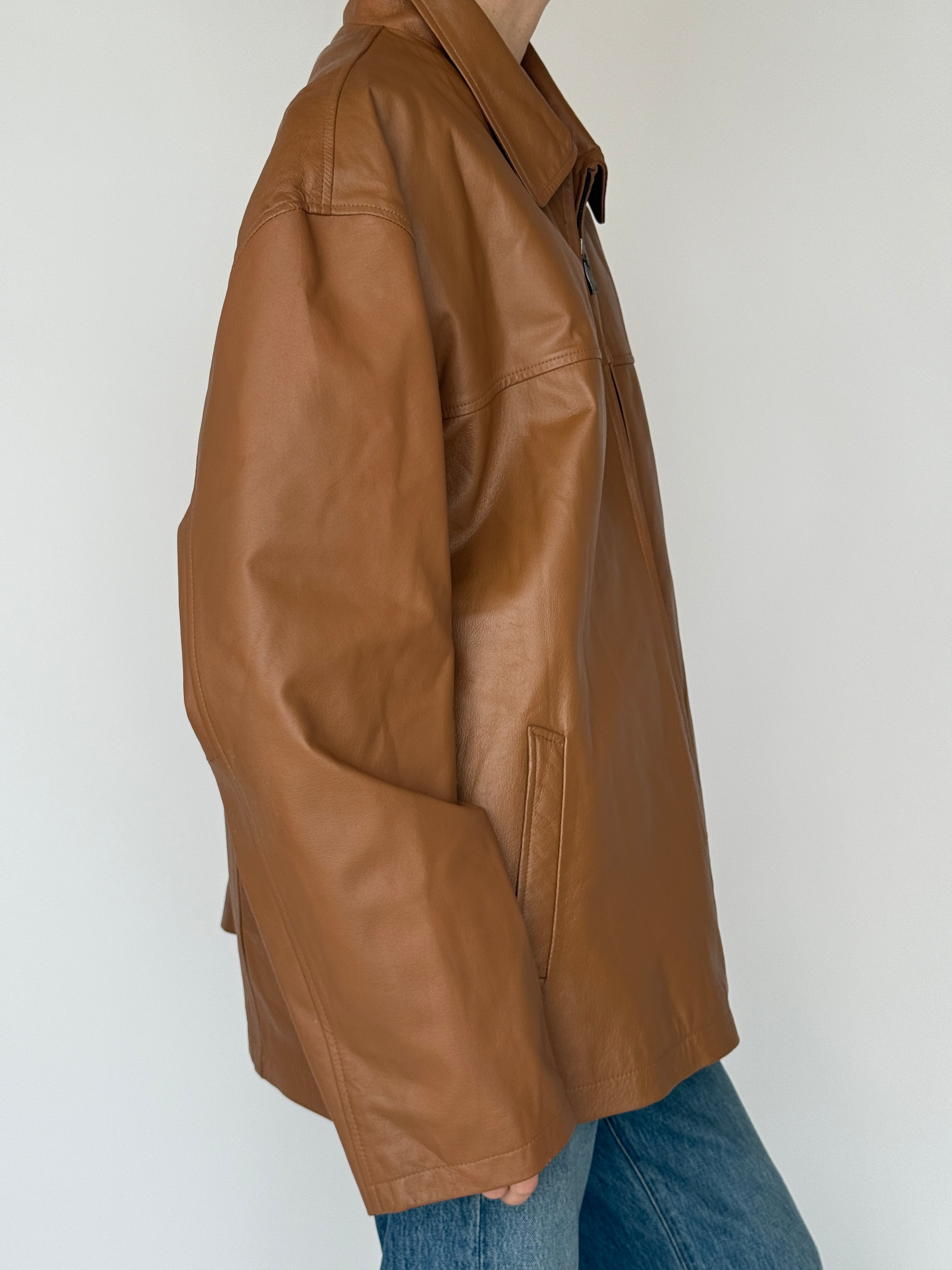 Vintage brown leather jacket side view