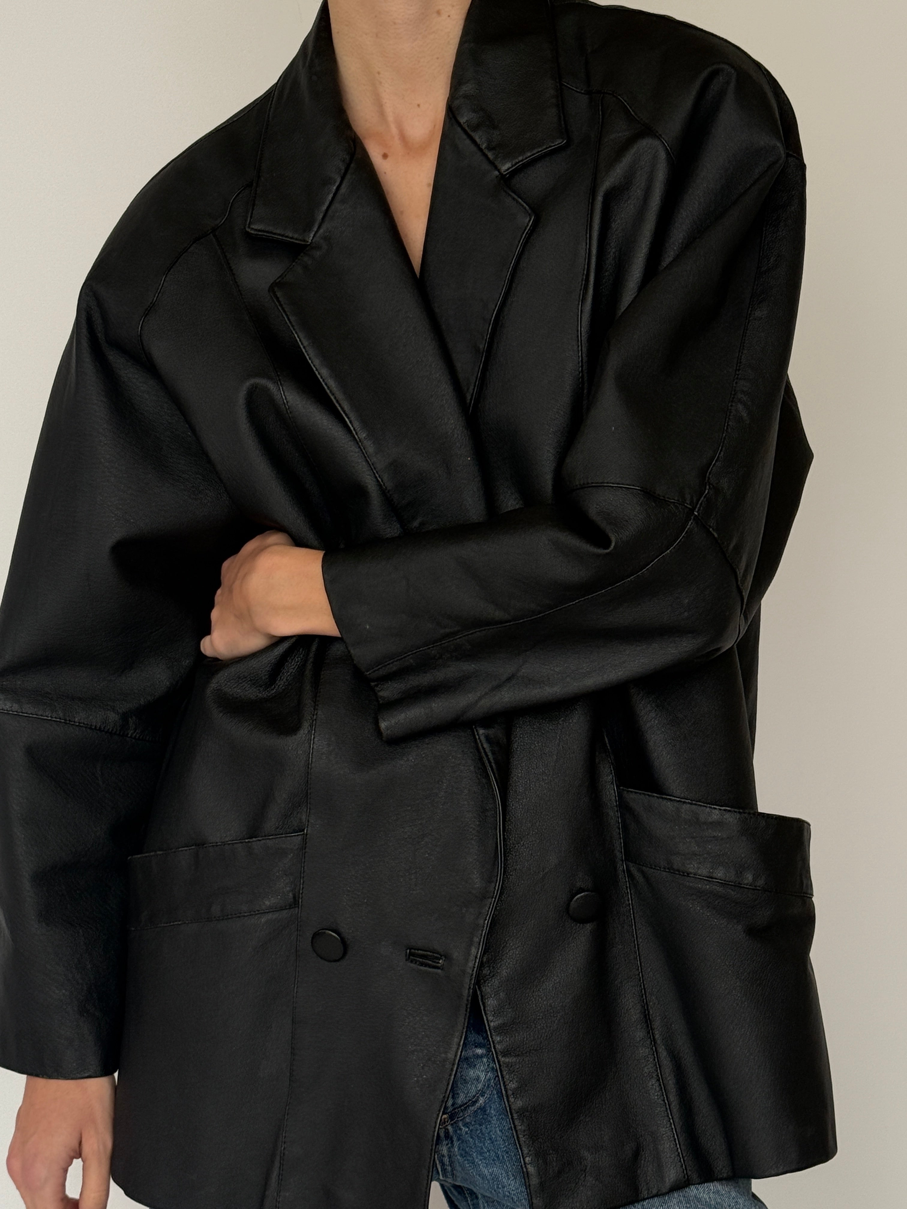 Vintage black leather blazer lapel detail