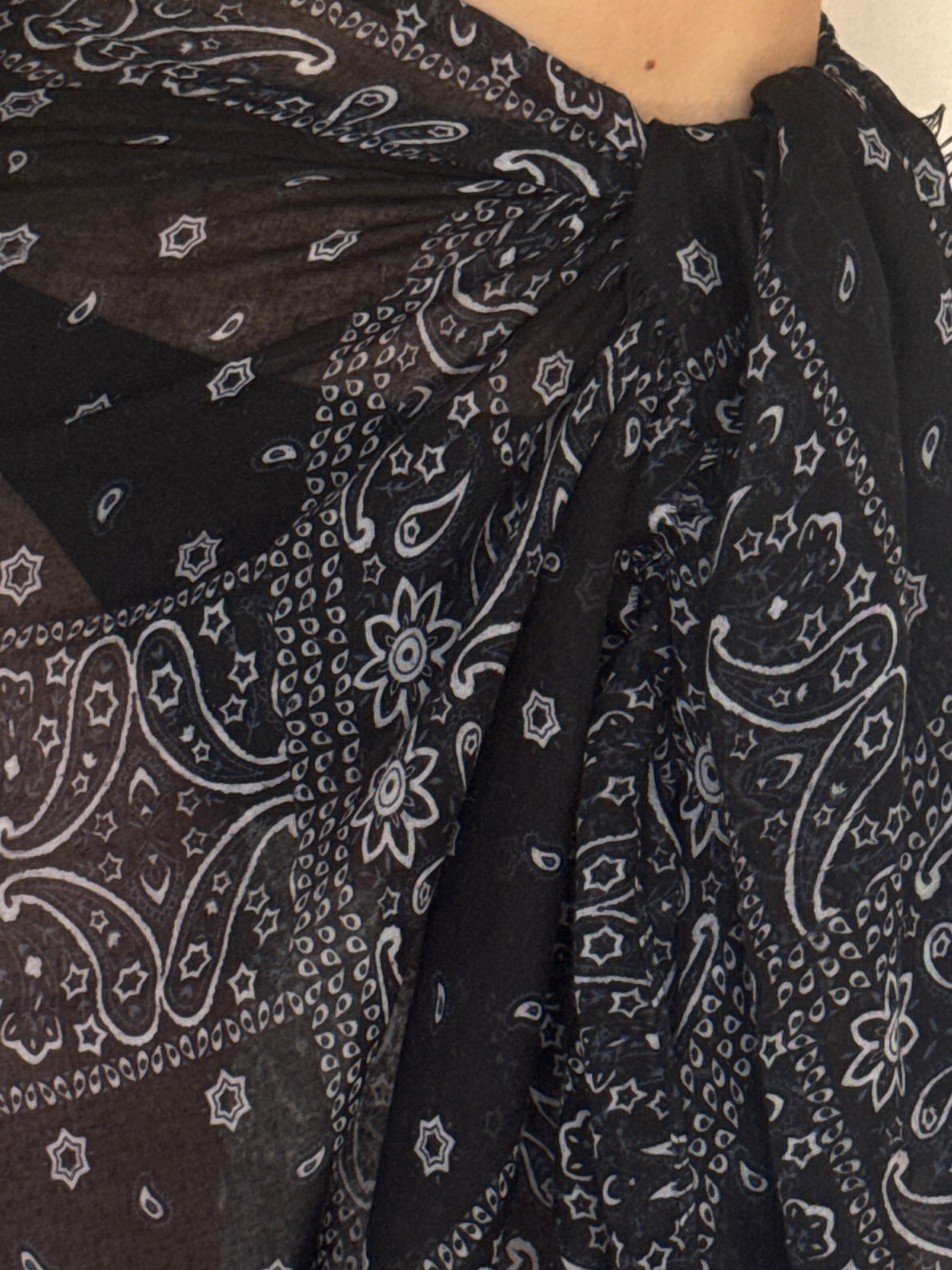 Vintage black sheer paisley sarong fabric close-up