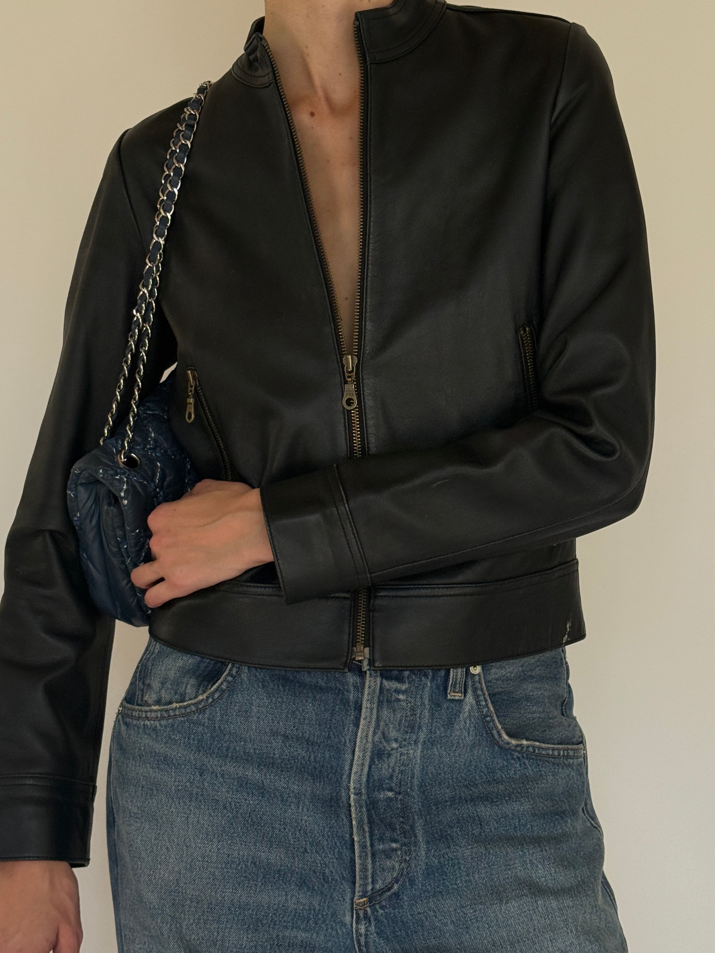 Vintage black leather jacket zipper detail