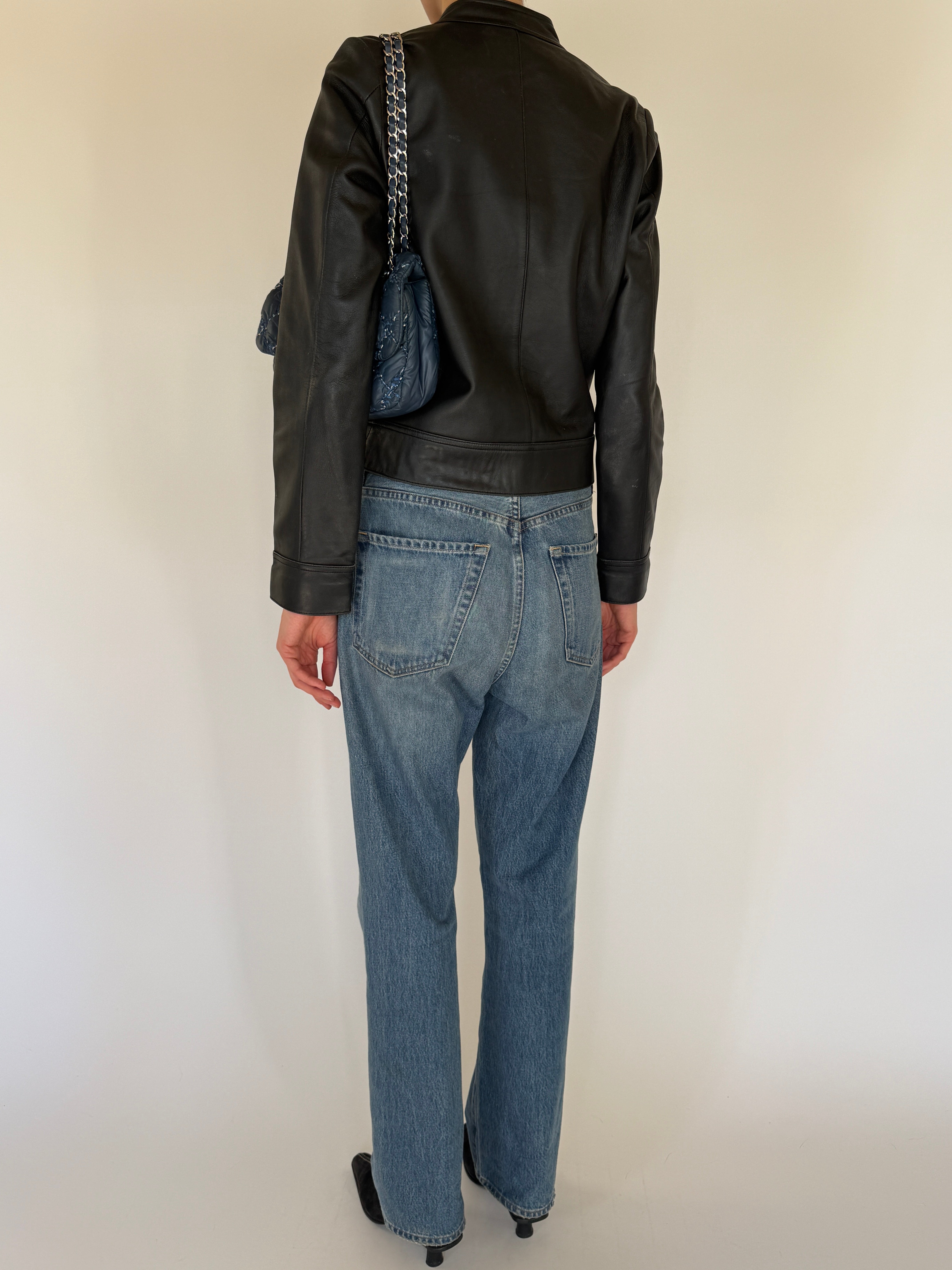 Vintage black leather jacket back view