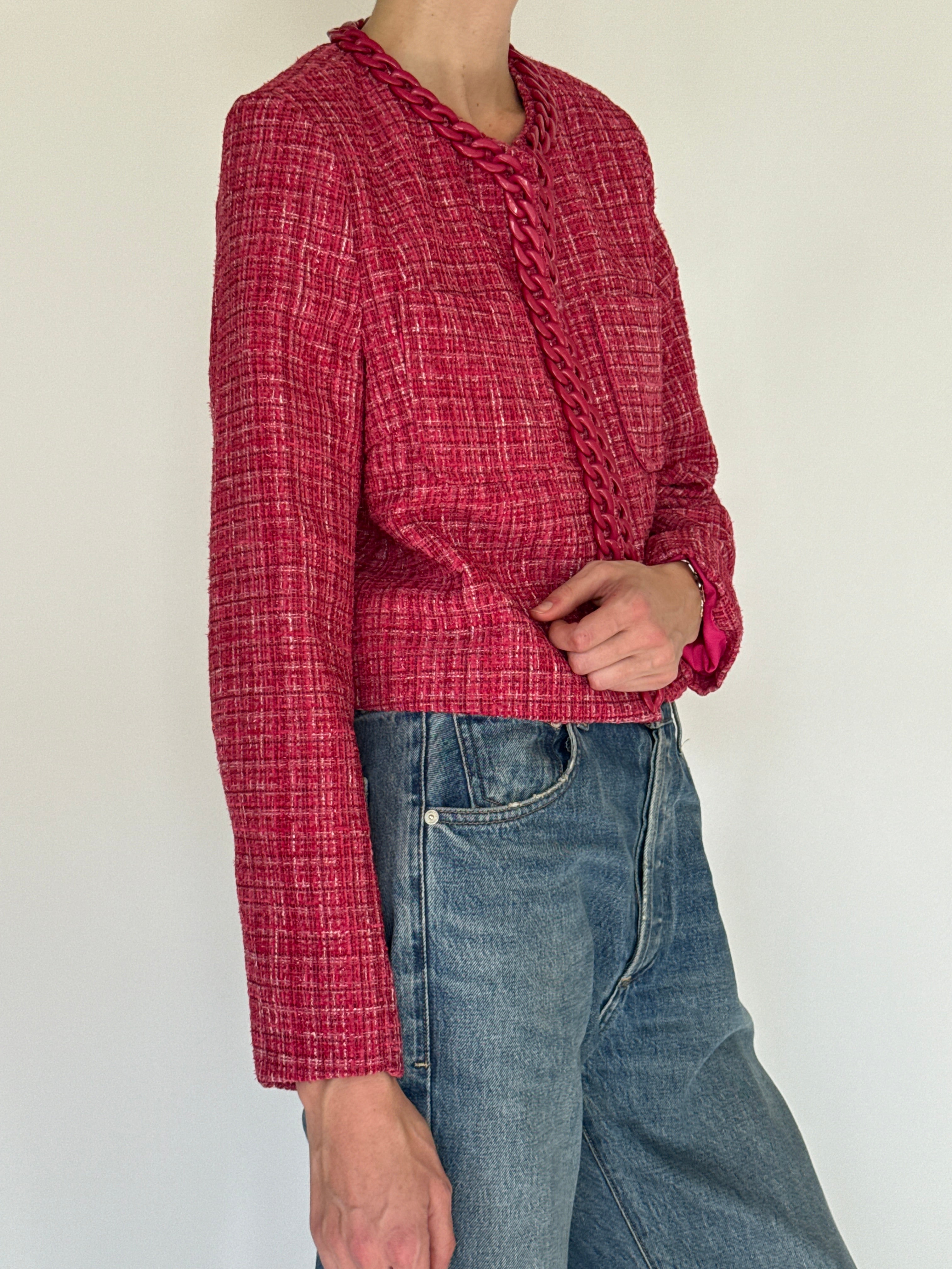 Vintage pink tweed chain trim jacket side view