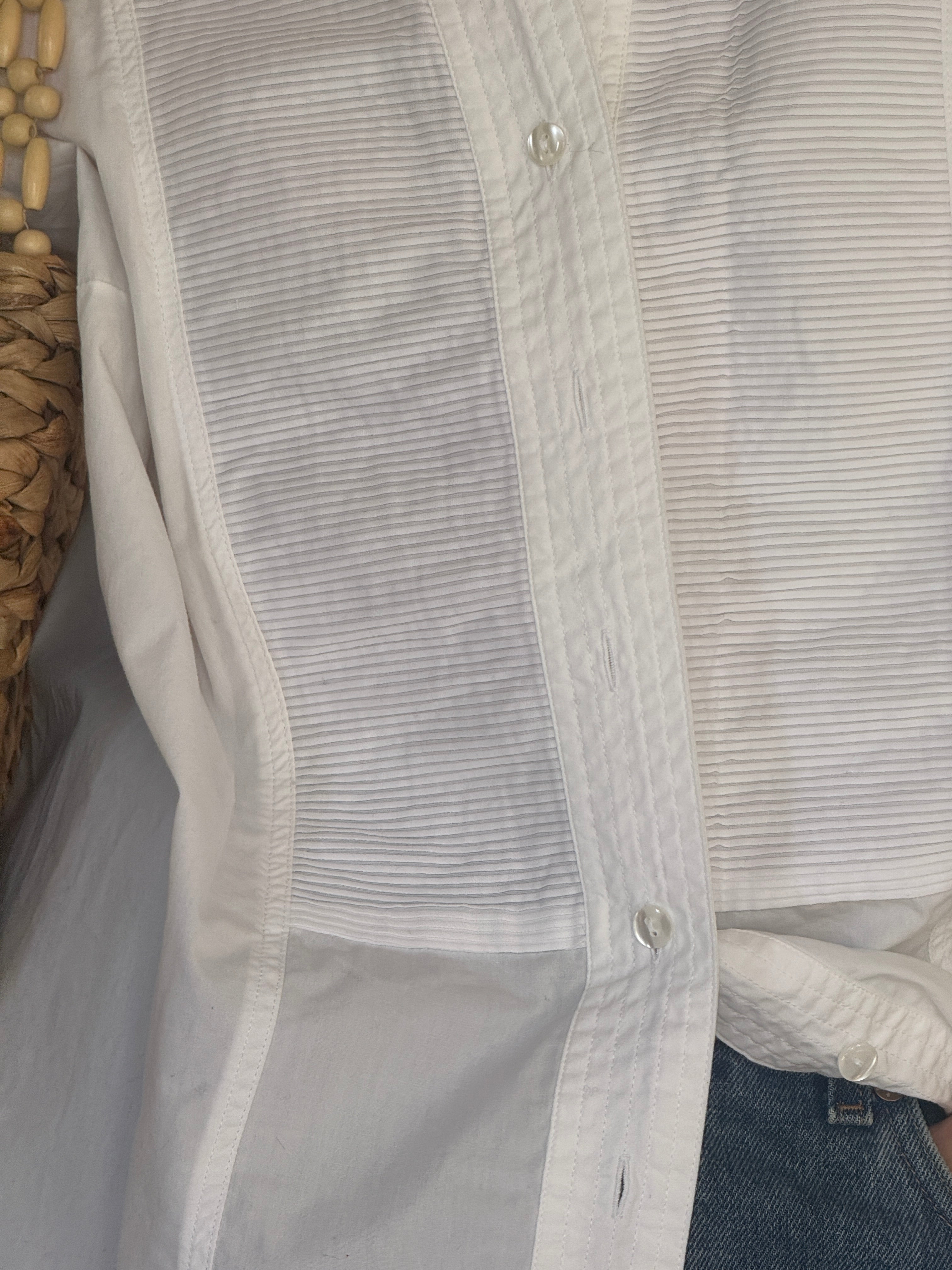 Vintage white cotton blouse fabric close-up lightweight cotton