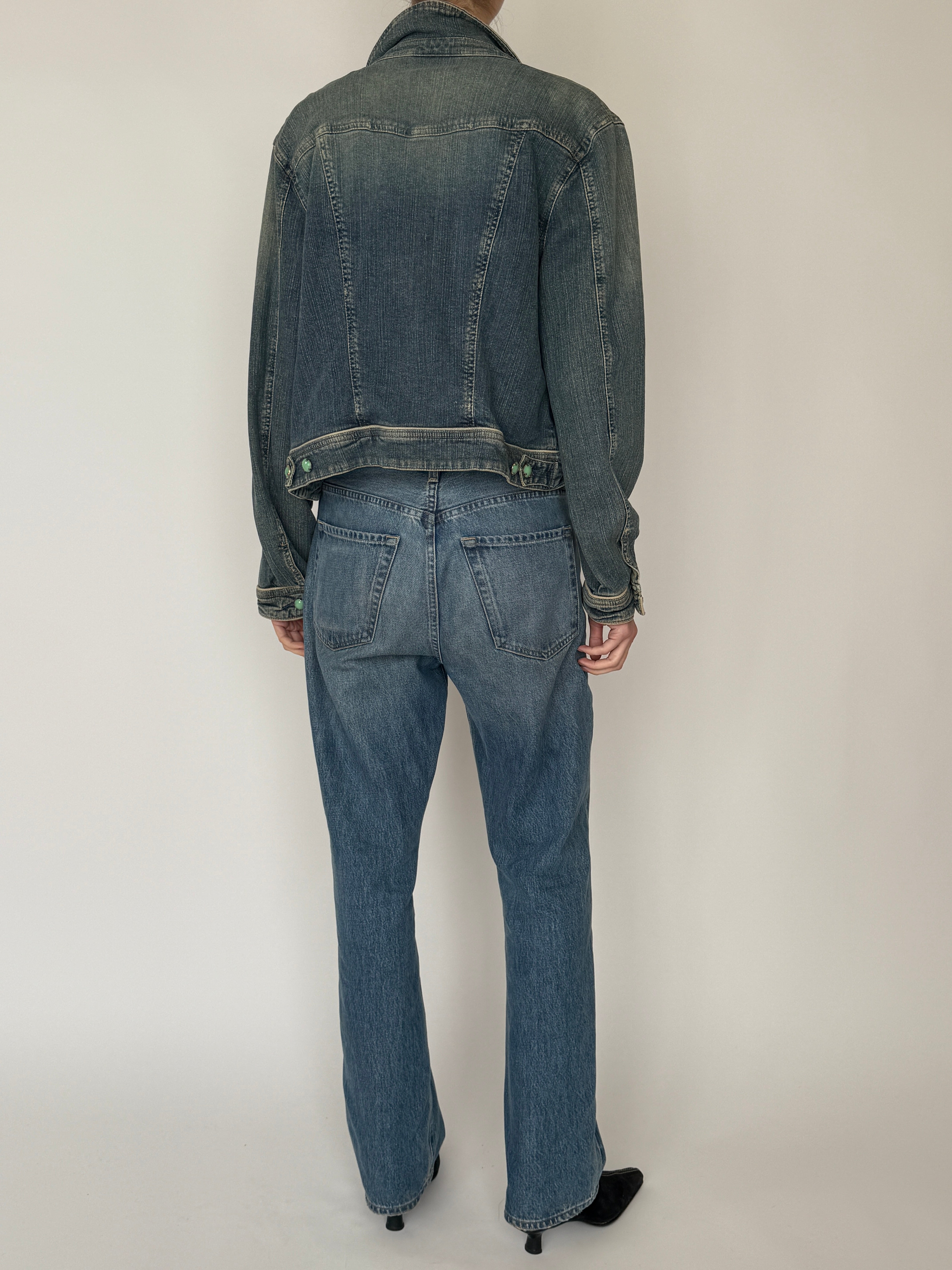 Vintage blue stretch denim jacket back view full-body