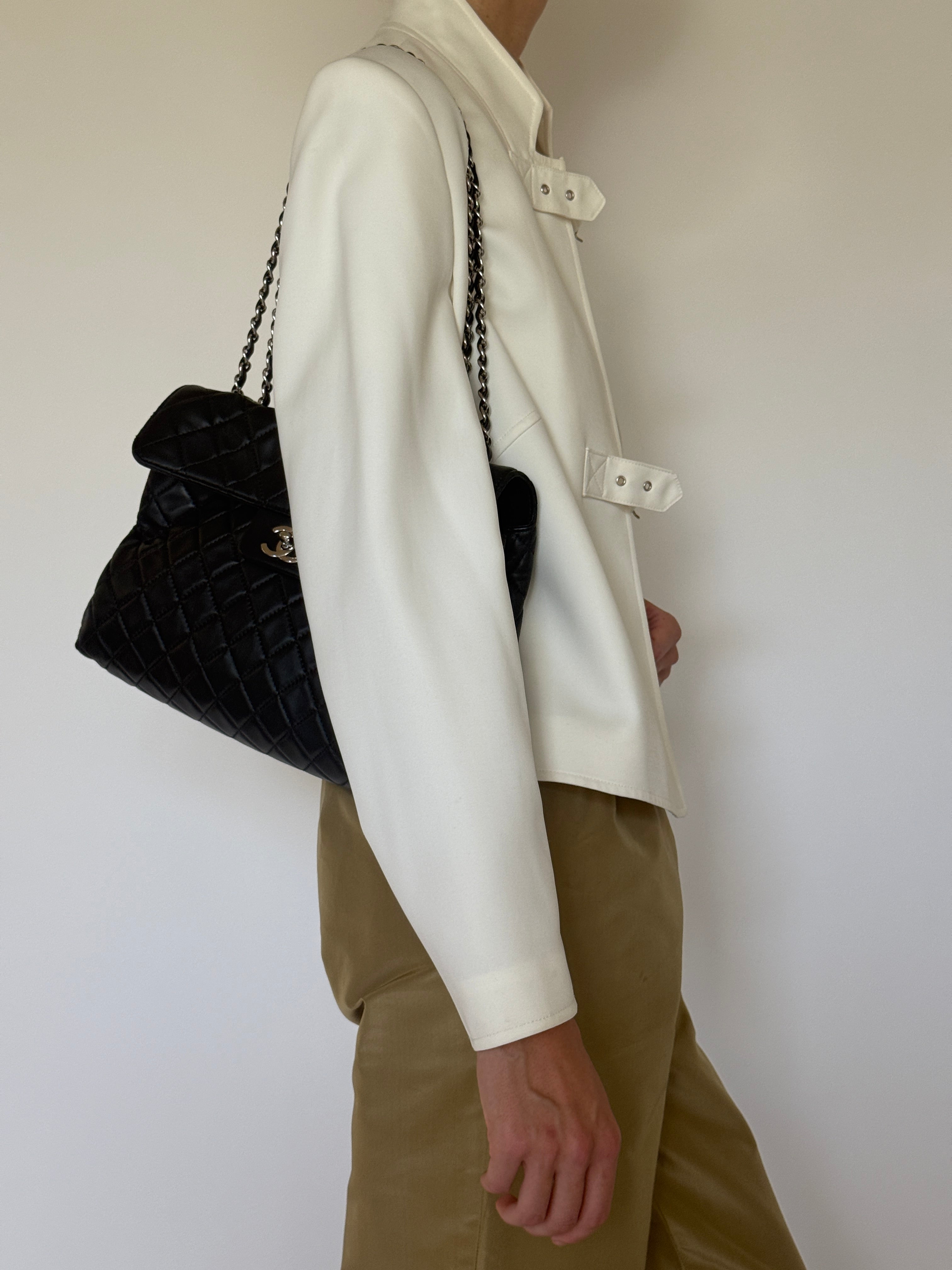 Vintage ivory buckle jacket side view