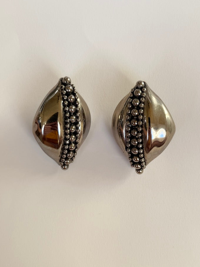 Sculptural leaf-like silver-tone vintage earring