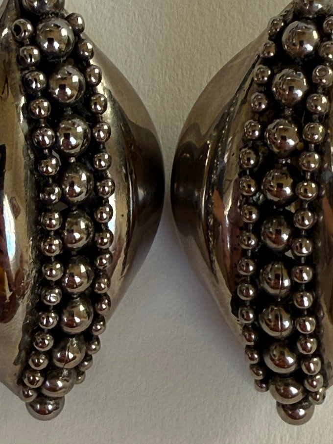 Sculptural leaf-like silver-tone vintage earring