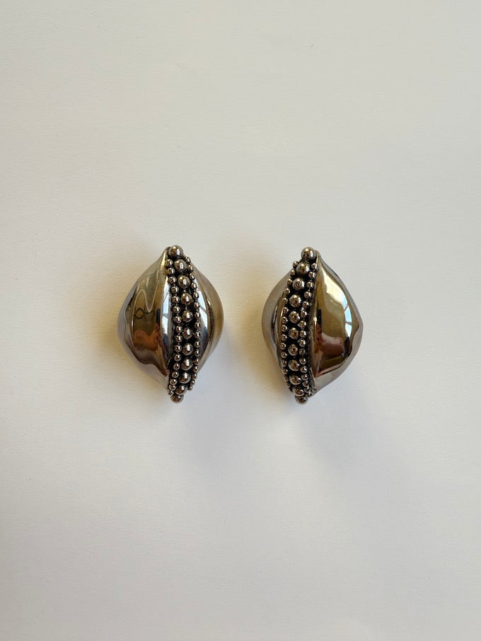 Sculptural leaf-like silver-tone vintage earring