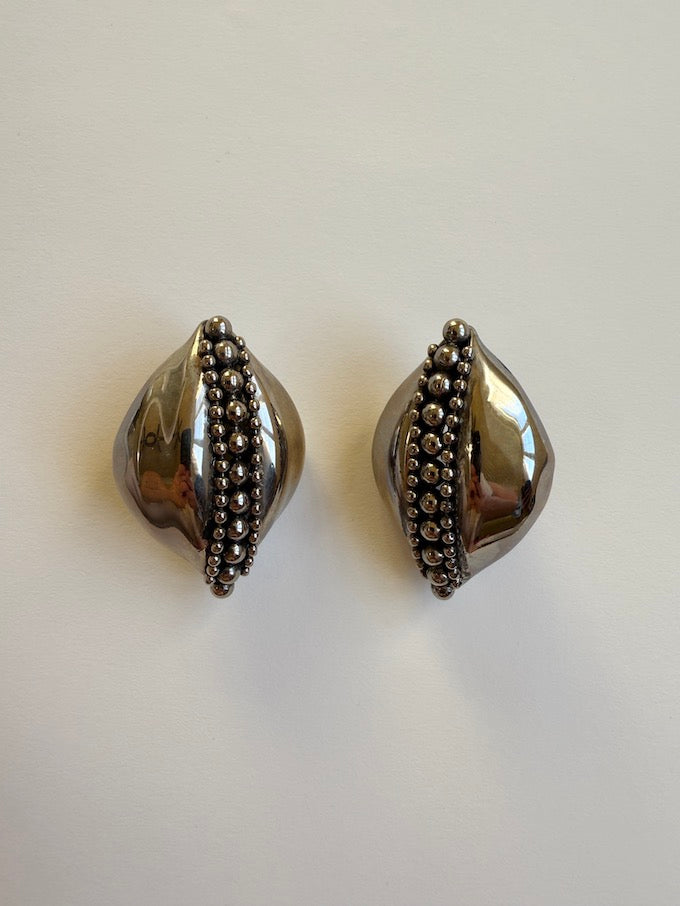 Sculptural leaf-like silver-tone vintage earring