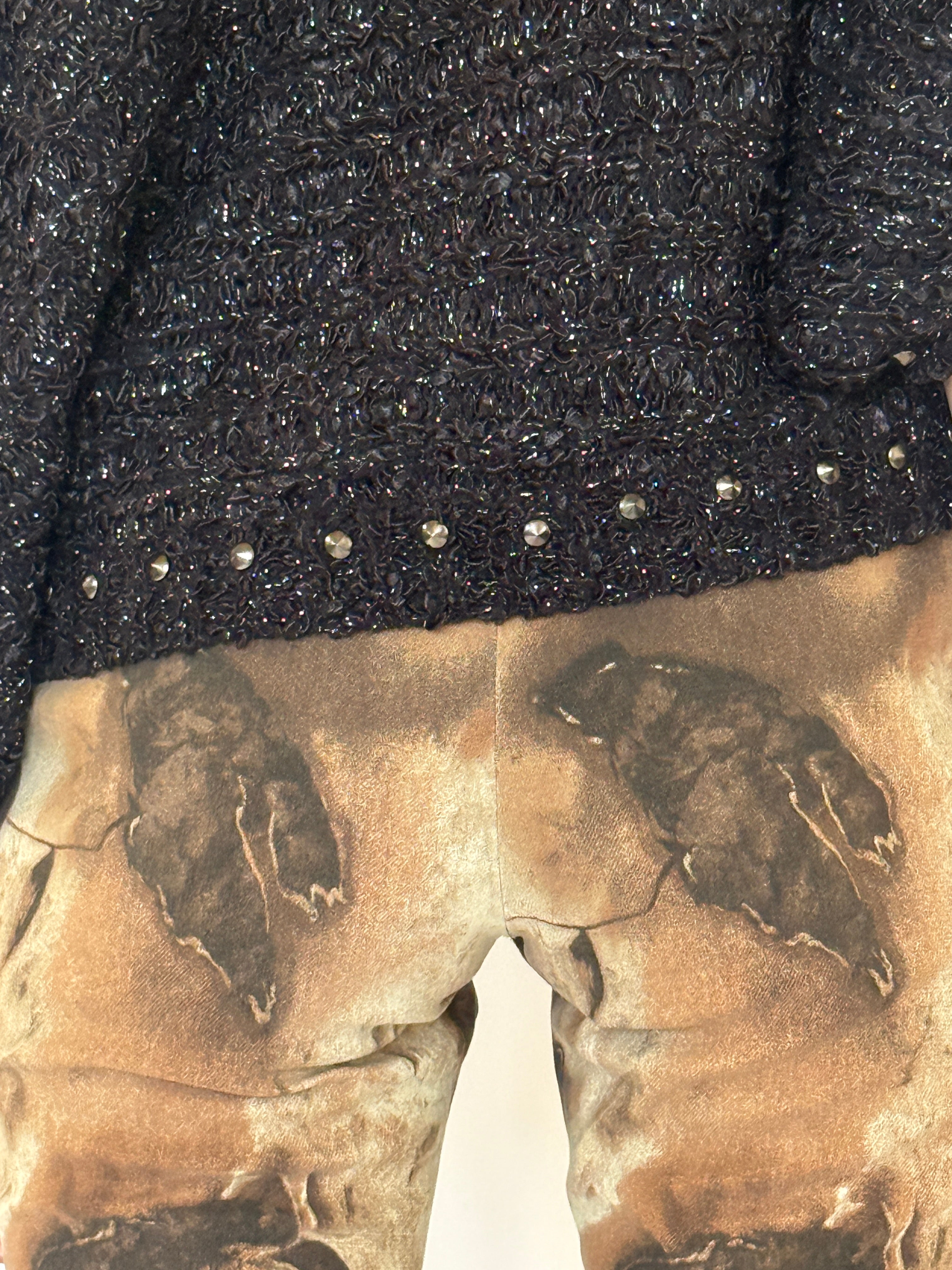 Vintage black metallic knit fabric close-up