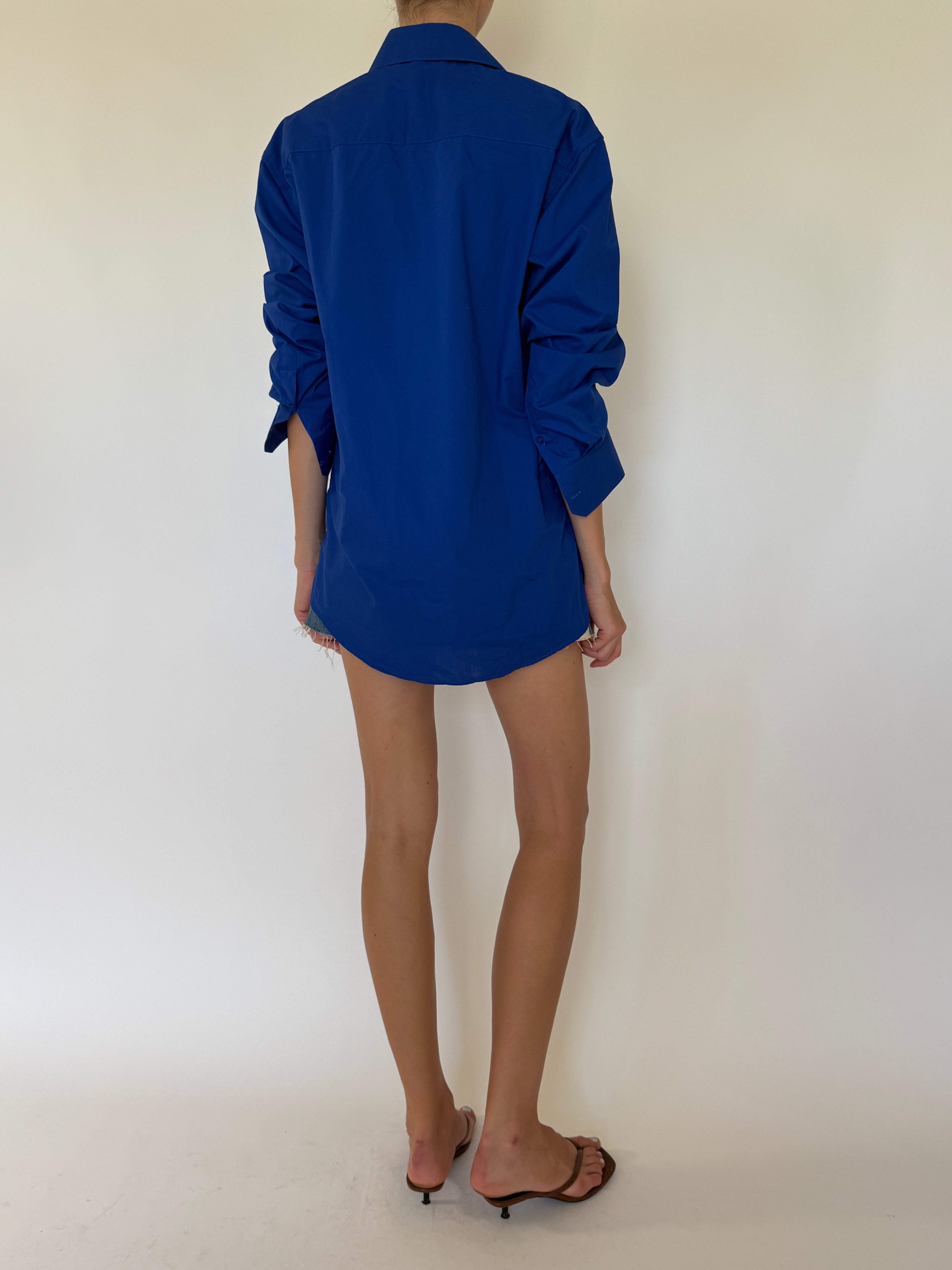Vintage cobalt blue button-up shirt back view