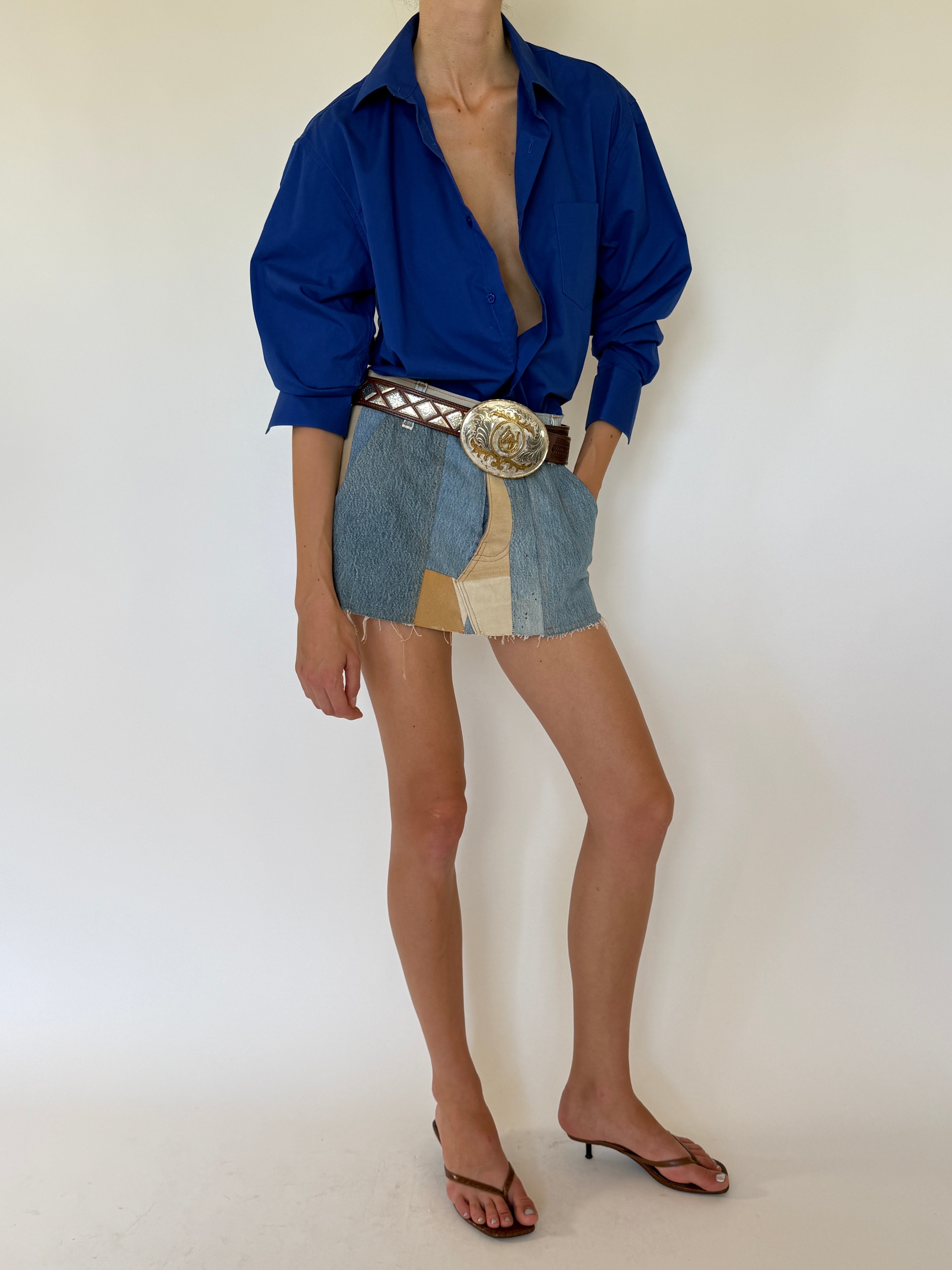 Vintage cobalt blue button-up shirt side view