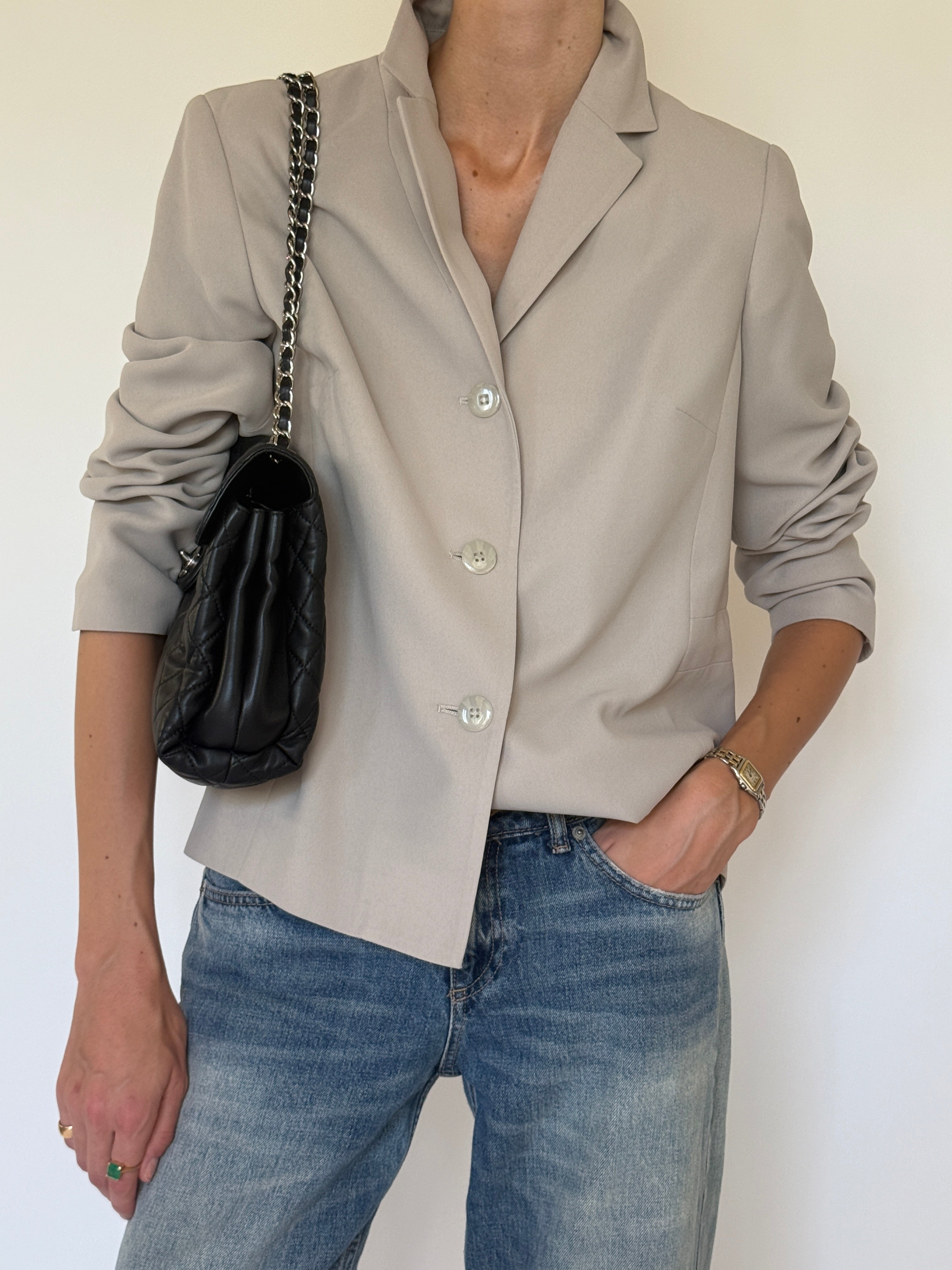 Vintage stone blazer fabric close-up