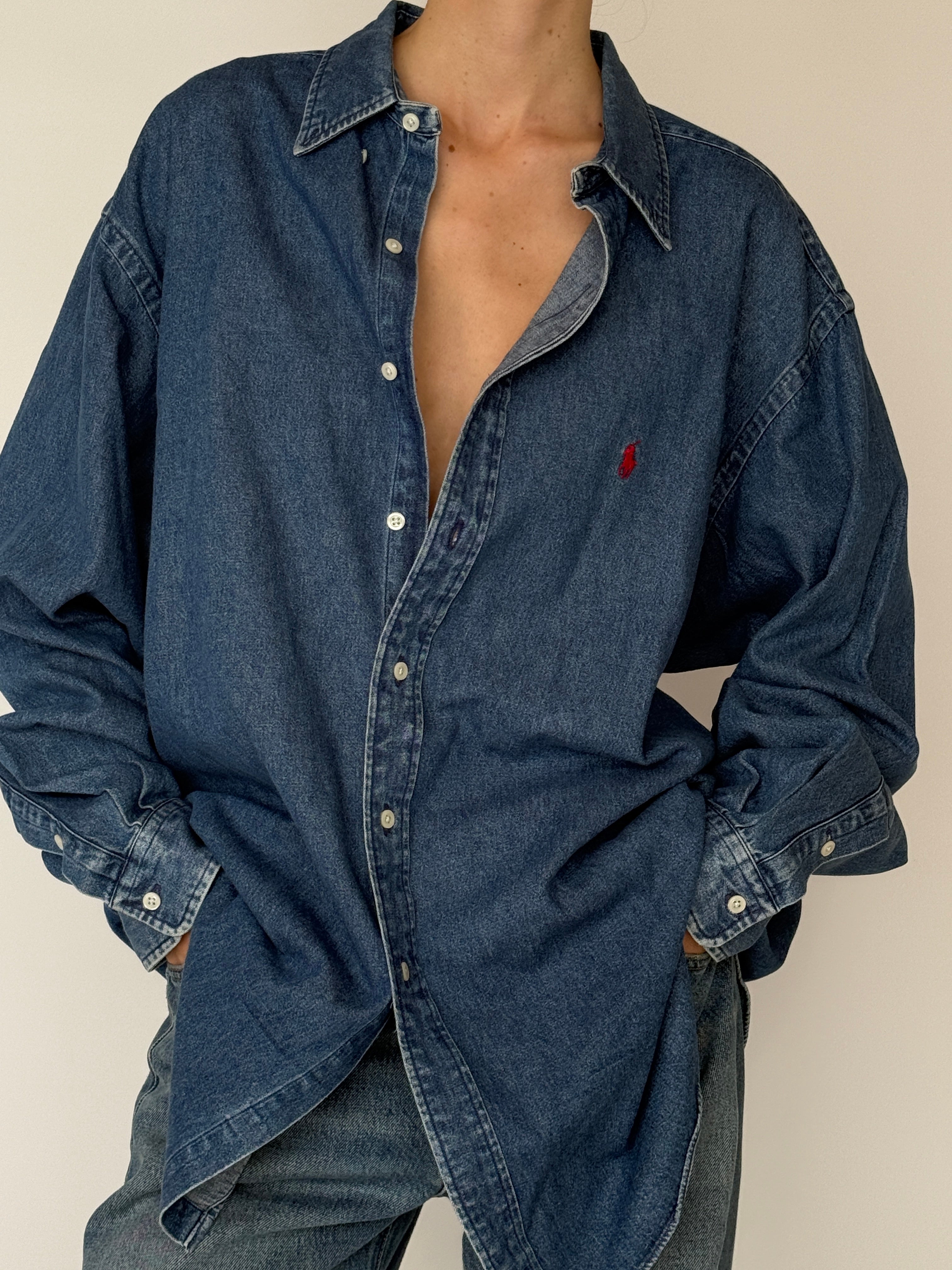Vintage denim button-down shirt with relaxed fit and embroidered logo in blue
