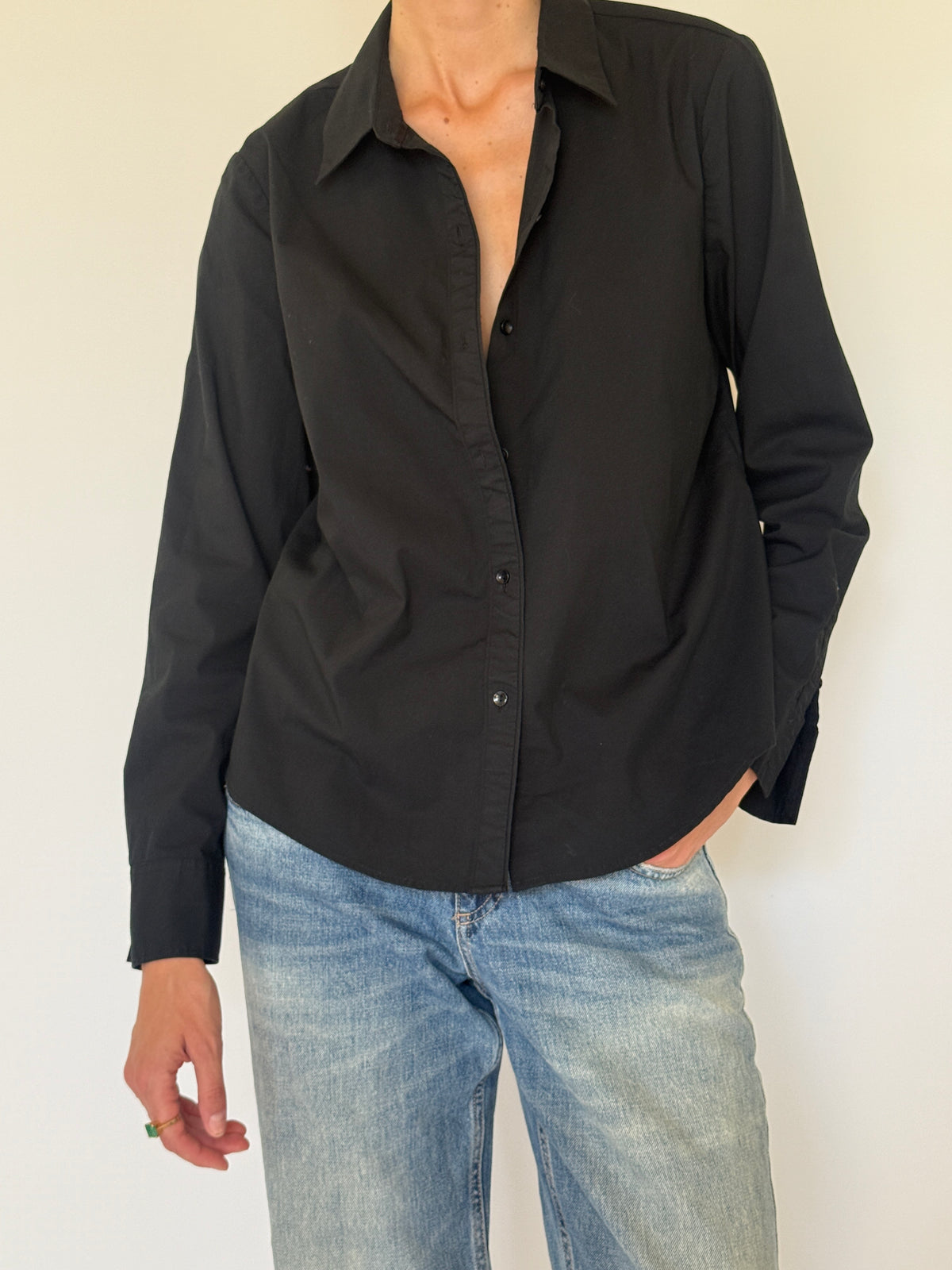 Vintage black cotton blend shirt fabric close-up