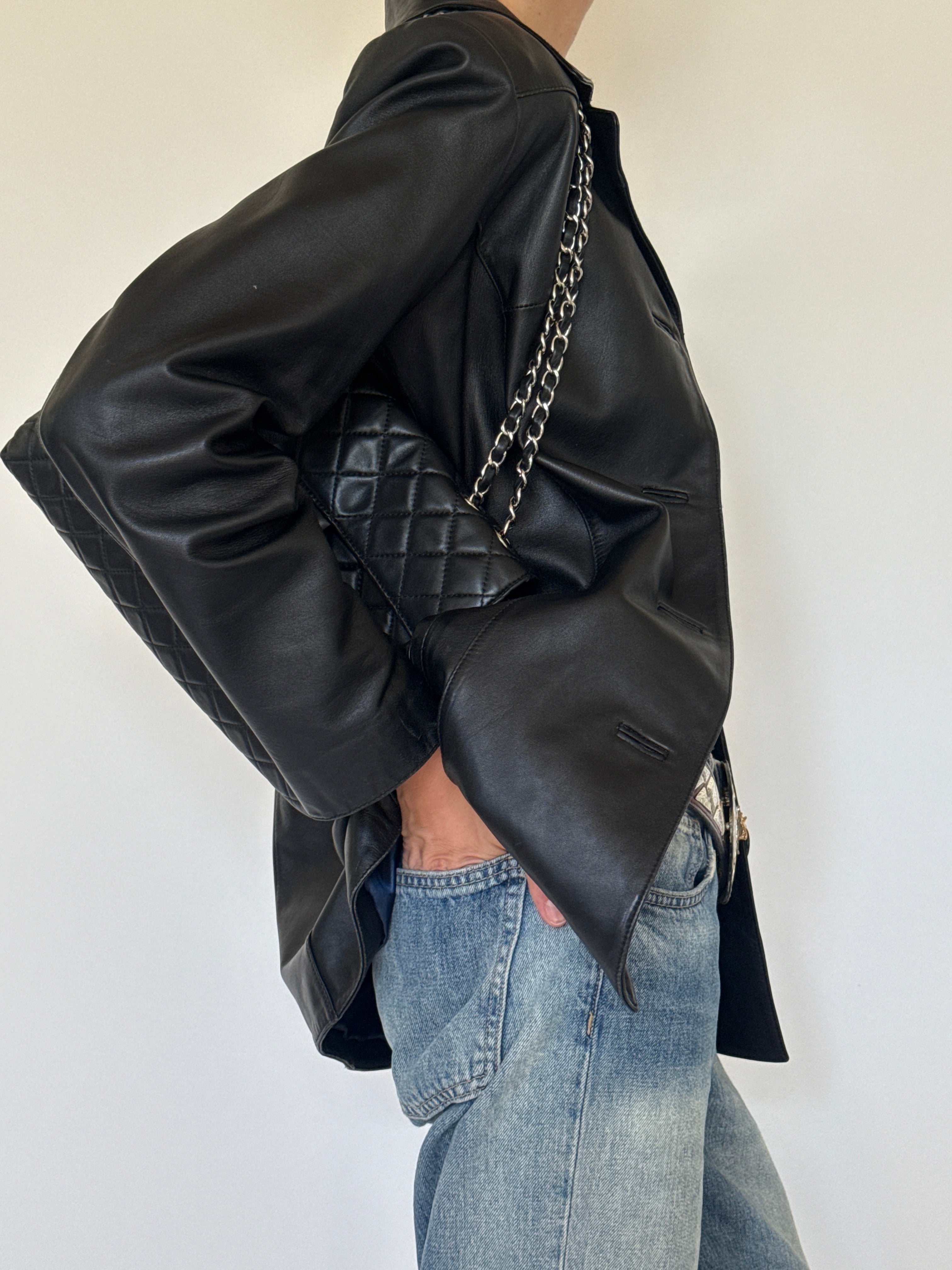Vintage black leather blazer side view